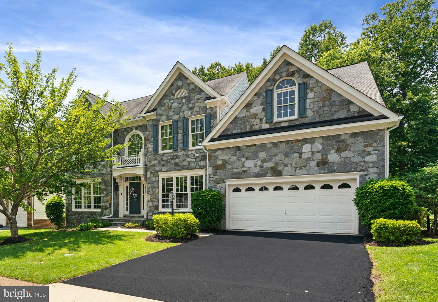 This Elegant Five Bedroom Home is a stunning residence nestled in the heart of the sought-after River Falls community in Woodbridge, Virginia. This large home features rich hardwood floors throughout most of the house. The Master Bedroom is a delight with a high cathedral ceiling, two walk-in closets and a beautiful full bath. In total, this house has four full bathrooms and one half bath. It boasts impeccable curb appeal and a spacious, thoughtfully designed layout perfect for everyday living and entertaining. Inside, you’ll find high ceilings, a large gourmet kitchen, and an abundance of natural light that highlights the luxurious crown molding and trim. The kitchen features premium appliances, granite countertops, and opens seamlessly to a cozy family room with a fireplace. Step outside to a beautiful fully fenced backyard with a large deck—ideal for relaxing or hosting summer gatherings. With top-rated schools, a nearby premium golf course, and convenient access to shopping and commuter routes, this home truly offers the best of comfort, style, and location. Other amenities include a neighborhood pool, playgrounds, as well as tennis and basketball courts reserved for resident use.