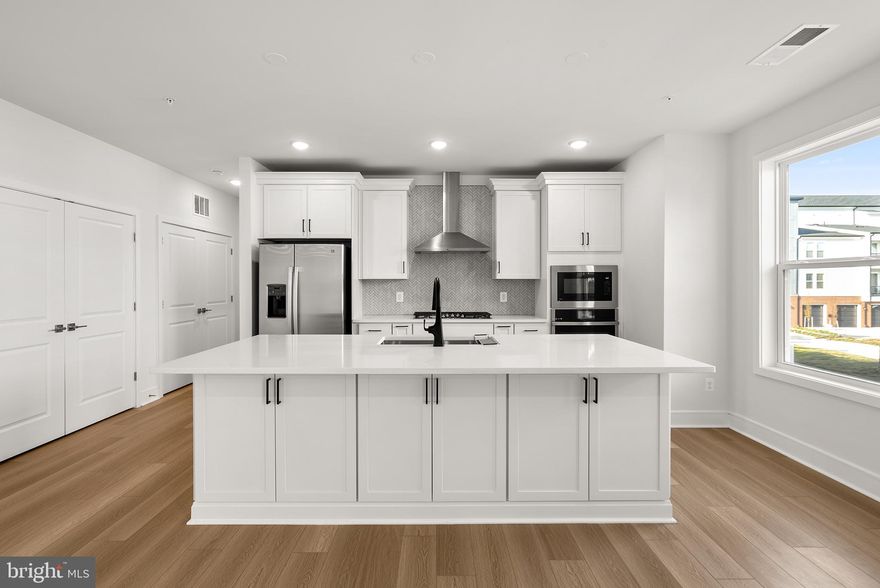 Come and claim your future dream home! Conveniently located and meticulously crafted, this BRAND NOTE: Do you want to close in 2024? There are options! NEW ACTIVE-ADULT (55+) CONDOMINIUM by Van Metre Homes at BIRCHWOOD is available for you to call home immediately! Spanning an impressive 1,845 finished square feet all on one level with lofty 10-foot ceilings and boasting three bedrooms and two full bathrooms, the WALKER III floorplan is designed to exceed your expectations. Step inside to be greeted by an abundance of natural light that illuminates the expansive, inviting living spaces, seamlessly connected by stylish and durable wide luxury vinyl plank flooring. The heart of the home lies in the spacious gourmet kitchen, where upgraded white cabinets, quartz countertops, and stainless-steel appliances elevate the culinary experience to new heights. Indulge in the luxury of the primary suite, featuring a generous walk-in closet and a spa-like bathroom complete with double sinks and a large frameless shower enclosure with a built-in seat – the perfect retreat after a long day. The two additional bedrooms and full bathroom are perfectly suited to meet your needs and complement your lifestyle. Additionally, this residence includes a 1-car garage, providing both security and convenience for your vehicle. Being a new build, your home is constructed to the highest energy efficiency standards, comes with a post-settlement warranty, and has never been lived in before! Don't miss your opportunity to experience the unparalleled elegance of the WALKER III floorplan. Schedule an appointment today! ----- Located in Northern Virginia, Birchwood at Brambleton is an Active Adult (55+) community that offers one-level condominiums and spacious single-family homes. Residents benefit from its close proximity to Brambleton’s restaurants, shopping, movies, and community events. The community boasts top-notch award-winning amenities like indoor and outdoor pools, bocce and pickleball courts, a fishing pond, and a golf simulator. Additionally, Birchwood at Brambleton’s convenient location places it just minutes away from Metro’s Silver Line, Dulles International Airport, commuter routes, and health centers, making it a prime destination for those seeking a well-connected and vibrant lifestyle. **TAKE ADVANTAGE of closing cost assistance by choosing Intercoastal Mortgage and Walker Title. **Other homes sites and delivery dates may be available. ----- Pricing, incentives, and homesite availability are subject to change. Photos are used for illustrative purposes only. The community lies within the Airport Impact Overlay District (within the 1 Mile Buffer). Due to its proximity to Dulles International Airport, this site is subject to aircraft overflights and aircraft noise. For details, please consult a Community Experience Team. NOTE: The builder can close a cash buyer by December 17th 2024, and if financing, the builder can close by the end of January. ACT NOW!