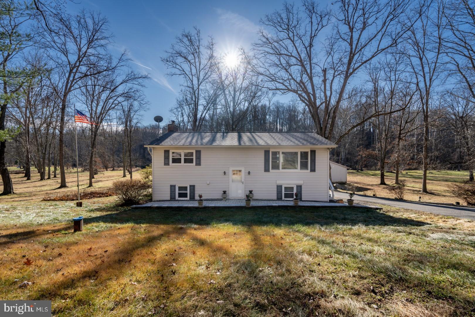 New Listing in Monkton. 16352 Falls Rd. is situation on 3.44 acres backing to the Gunpowder River with easy access to the NCR Trail- Monkton Station. Hereford Schools! A unique opportunity to live where you play. This split level home offers two separate living spaces, perfect for enjoying time with family and friends. Multiple updates include two fully renovated baths, new windows and blinds, and new flooring throughout the lower level. Enjoy the additional convenience of a full-sized laundry room and a separate mudroom leading to a new outdoor patio. A detached 2 car garage with a separate workroom and attic, as well as a separate shed, also with attic space, offers convenient storage for yard equipment and tools.
Offers due by Tuesday December 12th. Please submit highest and best by 4pm.
