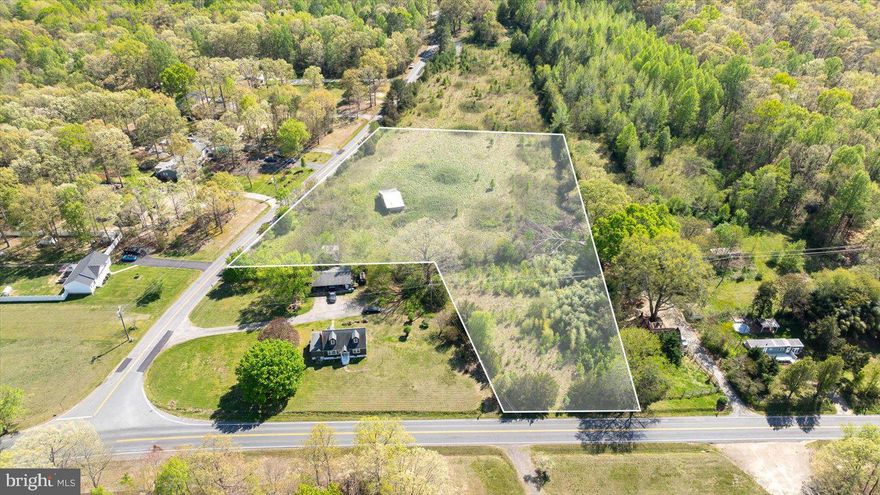 Nestled within the serene landscapes of Spotsylvania Courthouse, VA, this exquisite 3.1735-acre parcel presents a rare opportunity to own a slice of paradise at 6206 Morris Rd. Offering a harmonious blend of level terrain and graceful openness, this land is mostly cleared, save for the natural beauty of native briars and brush, setting the stage for your dream home amidst Virginia's unparalleled countryside charm.

With frontage on both Hams Ford Road and Morris Road, this property promises not only easy access but also the potential for enhanced connectivity with road improvements planned for both roads, ensuring a smooth journey to your private haven or future development. Although currently not perc tested, the optimism is high, given the successful conventional 3-bedroom perc tests on the southern lot, hinting at the promising future of constructing a residence or multiple dwellings that harmonize with the tranquil surrounds.

Adding to the allure is a sturdy barn that conveys with the property "as is, where is", offering a rustic canvas for renovation or repurposing into a charming workshop, stable, or storied addition to your estate. Its presence on the land adds a touch of nostalgia and potential for creative transformation.

This parcel is not just land; it's an opportunity to craft a lifestyle defined by peace, privacy, and the pleasure of designing your vision from the ground up. Whether you dream of a bespoke family residence, a pastoral retreat, or an investment in Spotsylvania's sought-after locale, this property is an open canvas waiting for your imprint.

Capture the essence of country living with the convenience of proximity to local amenities, historical sites, and the inviting community of Spotsylvania Courthouse. This land is not just a place to live; it's a place to thrive, to dream, and to create a legacy.