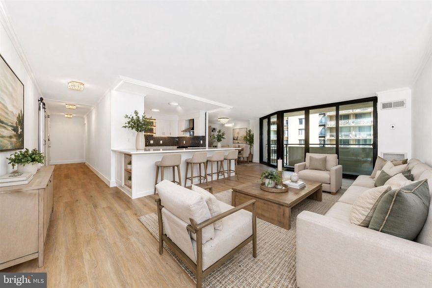 A Designer’s Masterpiece: Modern Luxury Meets Chevy Chase Tradition.  Welcome to your new home 902W at 4620 N Park Ave— a Coveted End-Unit Meticulously Reimagined into your "Gem-Like Oasis." Overlooking the lush greenery of the park, this residence offers a tranquil, sophisticated, modern interpretation of the classic Chevy Chase lifestyle. The Chef’s Showstopper Kitchen: The Heart of your new home is a Designer Open Kitchen that defies expectations. Gorgeous Large Format Porcelain Tile Flooring on the inside, outside, Illuminated by Custom LED Lighting, an Expansive Quartz Peninsula Creates the Ultimate Entertaining Hub.  Rare Norwegian Blue Pearl Granite Backsplash Sparkles.  Above the Kitchen Sink, Live-Edge Open Shelving Bridges the Hagerstown Kitchen’s White Custom Cabinets.  Beauty and Function Seamlessly Combine with All New Stainless-Steel Appliances, Two-Zone Beverage Cooler, Drawer Microwave, Built in Trash and Recycling Bins, Dazzling New Stainless-Steel Hood and Cabinet Space Galore.  The Spa-Like Primary Retreat:  Primary Bathroom with Rare Modern Dual Vanity.  Massive Backlit LED Mirror, Gleaming Porcelain Walls, Understated Marble Walk in Shower and Yes, the Heated Marble Flooring you’ve always wanted.  From the Hand-Crafted Marble Niche, Extended Ceiling Height, Multiple Shower Options—Every Detail was curated to Pamper you with a 5 Star Hotel Spa Experience.  Sophisticated Details Throughout:  The attention to detail extends to every corner and the sum is greater than the parts:  Secondary Bath: Marble Flooring, Jewel Like Tub/Shower Surround and Gorgeous Vanity.  Reimagined Laundry: A dedicated laundry room that feels like a Utility Suite, featuring elegant Marble Flooring, New Stainless Steel Wash Sink, Custom Wall Cabinets, Folding Laundry Shelf and New Full-Size Stacked Washer and Dryer.  Bright & Airy: As an end unit, the home is Flooded with Natural Light, Highlighting the Wide-Plank LVP Flooring, Tasteful Built in Cabinets, Open Kitchen.  Enjoy your morning coffee on the private balcony (with rare dual doors) overlooking the park and the vibrant Chevy Chase skyline.  Located in one of the most prestigious corridors of Maryland, you are steps away from high-end shopping, fine dining, and the Metro. This is more than a condo; it is a meticulously crafted sanctuary built to be loved for decades to come.  Key Features for the "Bullet Points" Section: Interior: Norwegian Blue Pearl Granite, Live-Wood Shelving, Quartz Countertops.  Open Kitchen with Counter Seating for both Family and Friends.  All New Appliances: Drawer Microwave, Gas Range, Dishwasher, 2-Zone Wine/Beverage Cooler, In-Unit Laundry Suite with Full Size Washer and Dryer. Bathrooms: Heated Marble Floors (Primary), Dual Vanity, Frameless Glass Door Marble Shower. Lighting: Designer LED, Modern Crystal Flush Mounts, Halo-Lit Mirrors. View: Park View, End Unit.  Experience a modern sanctuary in the heart of 20815.