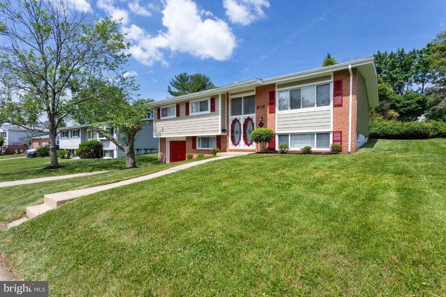 Contracts due by noon Tuesday  6/8/21 Welcome Home to this beautiful renovated split foyer.  The double doors with etched glass  sets the stage for the cool tiled foyer, with large coat closet.  A little bling  added with the chandelier, and splash of deep red.  Up the stairs you are met by expansive hardwoods show casing the open concept living  space.  A built- in perfect for your needs, Those hardwoods are throughout the first level. And we have staged 3 areas to enhance your viewing. In the kitchen a 5 burner gas range and matching family sized,  36"  refrigerator, all appliances are stainless Frigidaire brand. Plenty of counter space including the great 5.5'x3' island. Contrasting cabinets. Give this kitchen a wow factor. The living room 29'x15' has space under the stunning chandelier, for dining. Step down into the den, more wide open spaces for family time, and entertaining. Out the back door is a great 2 level deck. Room for your outdoor kitchen on one level and seating on the lower level. Just right for dinner on the deck. A virtual staging shows another option. Regardless of how you use the space  the deck can give you years of use and little maintenance with vinyl railings.  Another level stepping down from the foyer is your lower level. Some much on this level you will be amazed. Again we have virtually stage a game room to share possibilities. But serious square footage for many uses live on this level. Access to your garage, an extra bedroom to the left. A huge utility room houses your mechanical systems, the laundry, and what I call a winter storage room. But there is room here for a true mud room for all those extra shoes and rain coats, back packs and garden tools. Also housed down here is the largest bath with a tub shower.