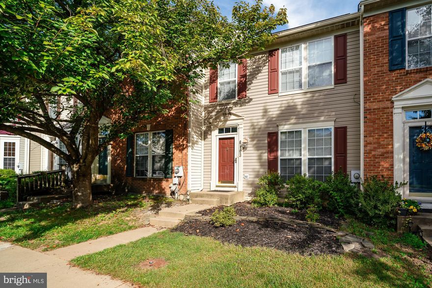 Welcome home to 6103 Newport Terrace in the fabulous community of Spring Ridge! This home is one of the largest townhomes in the neighborhood with a large three level full-width extension on all three levels! This gives you a bigger rec room in the basement, an added family room on the main level, and a sitting room and larger bath in the primary suite on the upper floor. As one of the largest floorplans in the neighborhood, you will have wonderful space to spread out and enjoy! You'll also enjoy the abundance of large windows that give the house so much wonderful natural light and those views out of the rear of the home! The main level has a living room, large kitchen with granite counters and stainless steel appliances as well as an island with a breakfast bar. The kitchen has an attached dining area and opens up to a large family room (that great bumpout!). Off the family room, French doors open to a large NEW (2024) deck which overlooks the treed area.The upper floor features a huge primary suite with an oversized bathroom as well as two other bedrooms and a second full bath. The primary bedroom has a large walk-in closet and a sitting room in addition to the main bedroom area. The primary bath has a soaking tub, double vanities, and a lovely shower! The basement has an enormous finished room as well as a terrific storage area which many townhomes are missing. The storage room includes a workshop area. There is additional storage in the built-ins in the main basement space. Off the recreation room, you can walk directly out to the fully fenced yard and paver patio in the backyard. The tree lined area behind the home offers a great view and added privacy. Also, the NEW (2024) A/C unit and NEARLY NEW (2023) furnace enable you to sit back and not worry about this largest home system. Dryer was also new in 2024. The primary bath JUST had a new **gorgeous** glass surround installed on the shower. On top of that, the ceramic tile surround in the upper hall bathroom was also just replaced this summer! It is a beautiful subway tile that elevates this bath! In addition, the upstairs faucets in both upper baths and primary bath light fixtures were just replaced. There was also some painting done throughout the home to freshen up some areas. As part of the Spring Ridge neighborhood, you will have access to *multiple* large pools, basketball courts, tennis courts, and all of the social activities organized in the community. Trash and yard waste removal as well as snow removal are also included for your convenience. Don't let this one get away from you! It's a treasure! Come take a look!