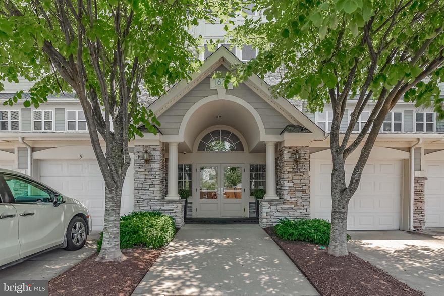 Stunning & light-filled OPEN concept condo with gorgeous views of the Potomac!  Enter the foyer and prepare to fall in love!  Hardwoods throuhgout!  Huge great room (living room) opens to gourmet kitchen with all Samsung stainless appliances, gas range, over-sized granite island, pantry and loads of 42 in cabinets.  Dining room (or eat-in kitchen) opens to cozy balcony.   Irresistible sunroom is surrounded by floor to ceiling windows with breath-taking views  of the Potomac River. Expansive master suite has walk-in closet, sitting area, dual vanities, deep  soaking tub & sep. glass enclosed shower. Den/office adds versatility to be used for a variety of purposes.   Gated community of Potomac Pointe offers pool, community center with party room, fitness center and more. Super convenient to take walking path to VRE! NOT to miss!