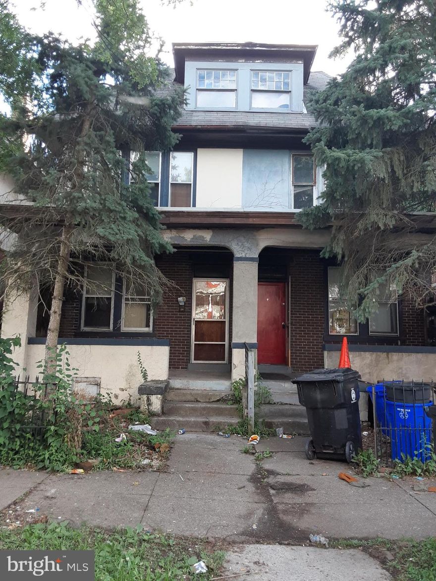 **PRICE ADJUSTMENT** With lots and lots of scrub-a-dub-dub and elbow grease ... This home will surely please! Bring the hardwood floors, trim and nostalgic staircase back to life. Convenient 1/2 bath on first level. Front & back staircases. Double up and consider purchasing the adjoining 716 N 18th also for sale! Ask me about available information for a 203k repair loan. Being sold "as is". Schedule your showing now!