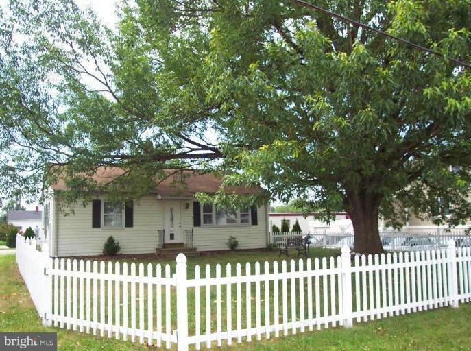Quality, cozy, well maintained and convenient. Fully renovated in 2012, this home features new stain resistant floors, granite counter tops, new HVAC, and more. Basement, new detached shed, fenced yard and zoned to allow for commercial use. Excellent opportunity to work from home!