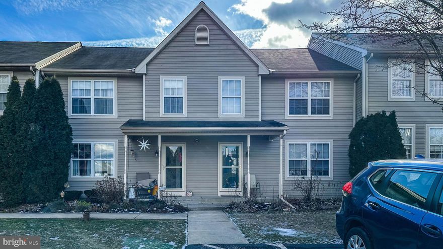 Welcome to this beautifully maintained home, where modern elegance and comfort come together seamlessly. As you enter, you're greeted by a spacious foyer featuring a newly added double closet for added convenience. The inviting eat-in kitchen boasts new quartz countertops, a deep stainless steel sink, and a new faucet, with all appliances being newer and ready for your culinary endeavors. The Kitchen Cortex Flooring is also new.  The expansive living room offers a cozy space with a striking mantel, gas fireplace, and a unique accent wall, perfect for both relaxing and entertaining. From here, sliders with interior mini blinds lead to an expanded Trex deck, ideal for enjoying outdoor moments. The formal dining room provides an elegant space for meals and gatherings, while the two large bedrooms each feature their own full bath. The back bedroom is a true retreat, with a walk-in closet, cathedral ceiling, and recent bathroom upgrades. Additional highlights include a new roof in 2018, a water heater replaced in 2022, a new A/C unit in 2019, and gas HVAC for comfort throughout. Tilt-in windows and a larger front porch enhance both the functionality and charm of this wonderful home. With its thoughtful updates and inviting spaces, this property is ready for you to move in and enjoy.