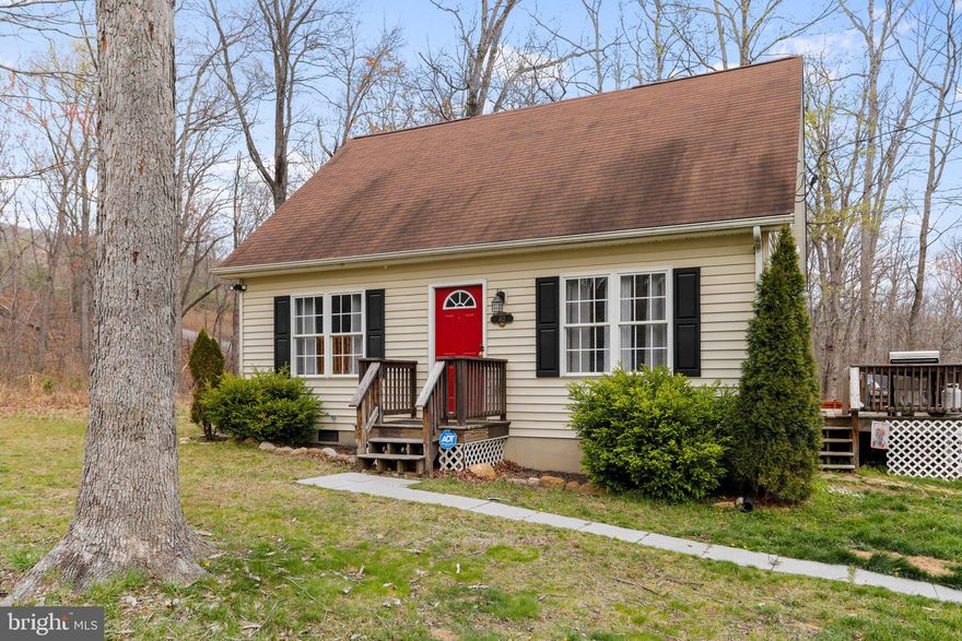 This cozy cape cod in Wild Acres has it all—a great location, updated accommodations, and access to the beautiful Shenandoah Valley. It's located in a scenic neighborhood on a half-acre lot. Inside, the cape offers one-level living, an open floor plan, and hardwood floors. There are two bedrooms and a full bath upstairs as well. Best of all, you can relax and cook out on the deck. The home has a brand-new HVAC system and fresh paint throughout. Living here offers a convenient commute to Winchester or Northern Virginia while also offering the advantages of Shenandoah Valley living—miles of hiking, biking, and river adventure. And after a day in the sun on the mountains or the river, you can sit back and relax at one of the many local wineries and breweries. Make this home yours; call your agent today.