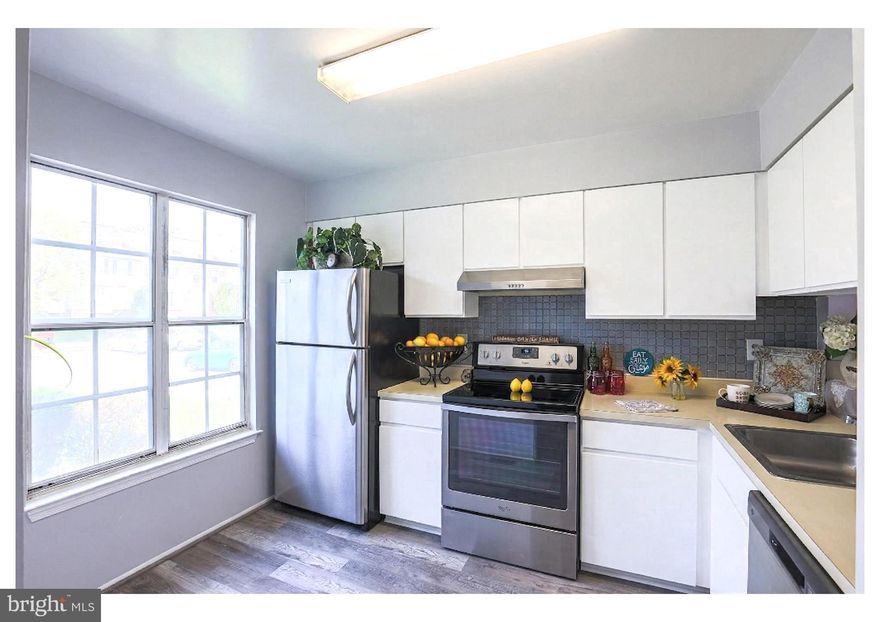 COMFORT, CONVENIENCE & PRIVACY. TUCKED AWAY ON A QUIET COURT WITHIN THE DESIRABLE ROCKFIELDS COMMUNITY ASSOCIATION, THIS WELL-MAINTAINED WINDSOR MILL MID-GROUP TOWNHOME OFFERS A SMARTLY DESIGNED 4-LEVEL LAYOUT THAT MAXIMIZES SPACE AND NATURAL LIGHT. THE UPPER LEVELS ARE ENHANCED BY SKYLIGHTS, BRINGING ADDITIONAL DAYLIGHT, CREATING A BRIGHT, OPEN FEEL. 
THE HOME FEATURES TWO GENEROUSLY SIZED BEDROOMS PLUS A VERSATILE TOP-FLOOR LOFT PROVIDING IDEAL FLEXIBILITY FOR A POSSIBLE THIRD BEDROOM, HOME OFFICE, OR BONUS LIVING AREA. THE PRIMARY BEDROOM SUITE HAS A WALK-IN CLOSET, SKYLIGHTS, AND CATHEDRAL CEILINGS.NEW CARPETING THROUGHOUT AND FRESH PAINT DELIVER TRUE MOVE-IN CONDITION.
THE MAIN LEVEL INCLUDES A CONVENIENT HALF BATH FOR GUESTS AND SLIDERS LEADING TO THE REAR DECK, PROVIDING SEAMLESS INDOOR-OUTDOOR FLOW THAT IS PERFECT FOR ENTERTAINING AND ENJOYING WARMER WEATHER. THE FINISHED LOWER LEVEL  OFFERS EXCELLENT FUNCTIONALITY FOR RECREATION, A FAMILY ROOM, OR WORK-FROM-HOME NEEDS, WITH WALK-OUT ACCESS TO A PAVED PATIO.
ENJOY THE ADDED PRIVACY WITH NO REAR NEIGHBORS. THIS PROPERTY REFLECTS PRIDE OF OWNERSHIP AND PRESENTS AN OUTSTANDING OPPORTUNITY FOR FIRST-TIME BUYERS OR ANYONE SEEKING A LOW-MAINTENANCE, MOVE-IN-READY HOME AT A VERY AFFORDABLE PRICE POINT.
IDEALLY LOCATED WITH EASY ACCESS TO I-695 AND I-95, FOOTSTEPS TO NEARBY SHOPPING, DINING, AND DAILY CONVENIENCES.