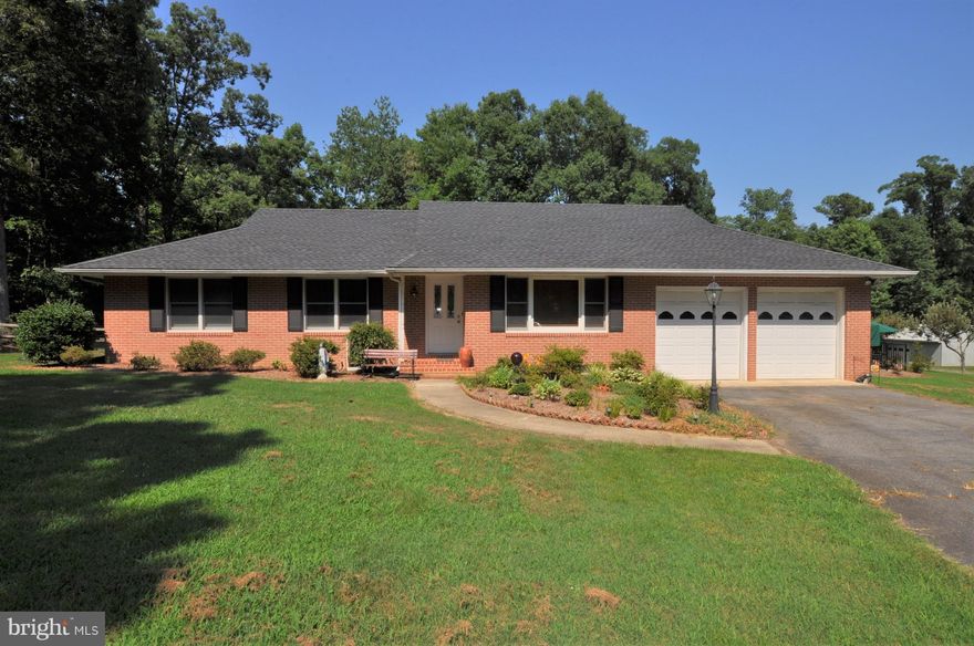 ALL BRICK BEAUTY w/ sparkling in-ground swimming pool is ready for you!  Enjoy summer evenings on the screened in porch -& lots of beautiful yard -over 3 acres! There's plenty of storage, too -w/3 large shed buildings & a 40x30 detchd garage/workshop. Inside features hardwood floors, new stainless steel appliances in kitchen & ceramic tile baths.There's even an office to work in! Come take a look!