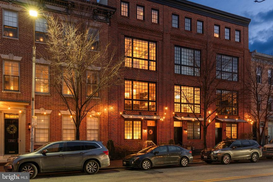 ESSENCE
Live authentically. Located in the heart of historic Fells Point, this expertly appointed townhome blends sophisticated city living with the warmth of neighborhood charm. Four levels, thoughtfully designed to feel both spacious and inviting, this Merchant Row townhouse offers an open floor plan that flows effortlessly for everyday living and entertaining. Welcome the natural light from the floor to ceiling windows throughout. Enjoy panoramic views of the harbor and the city from the rooftop deck, an unforgettable backdrop for any occasion. Two car garage. Every detail has been carefully curated, creating a refined yet cozy atmosphere. Cultivate your existence. The art of uniting human and home.

LOCAL FLAVOR AND PROVISIONS
Venture out onto the cobblestone streets, and enjoy some local favorites: Thames Street Oyster House,  Peter's Inn, Daily Grind, Kneads, Ovenbird Bakery, the list goes on.  Stock up on provisions at the Broadway Market and Whole Foods.

OUTINGS AND LEISURES
Enjoy the vibrant energy of the waterfront promenade, take a water taxi ride to explore the harbor or relax in the nearby park. Browse independent bookstores, vintage shops and artisan boutiques tucked into historic storefronts.

PROXIMITY
A quick walk, or even quicker drive to Harbor East and Canton, and zippy access to 83.

REGION
Fells Point, established in 1763, is a historic waterfront neighborhood renowned for its 18th-century maritime architecture, cobblestone streets, and vibrant nightlife. As one of Baltimore's original settlements, it was a major shipbuilding hub, featuring the oldest standing house and the oldest continuously operating saloon in America.