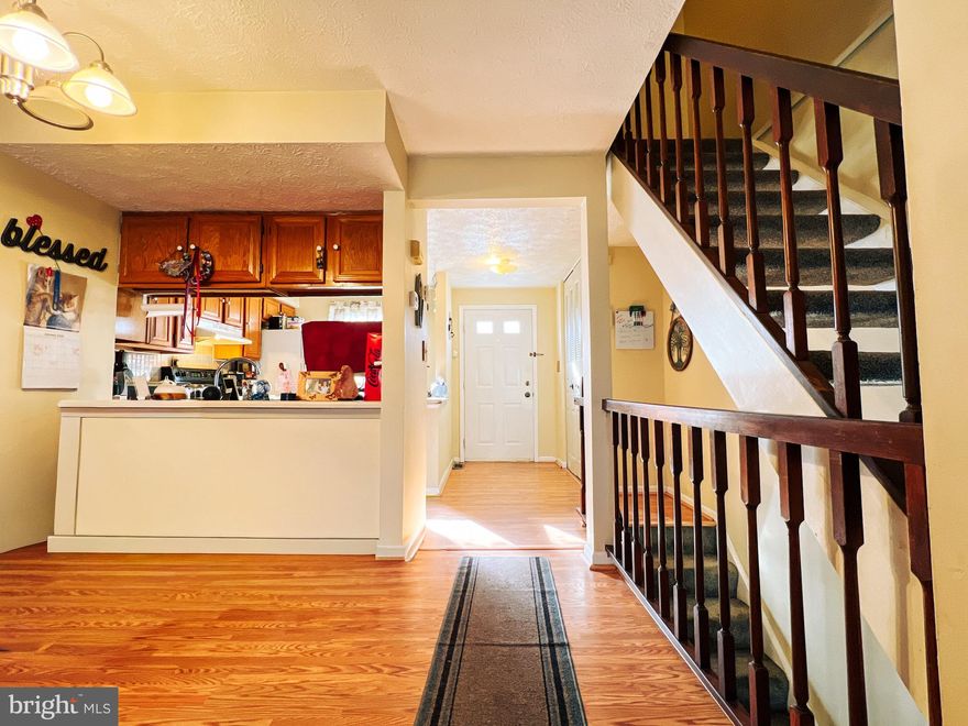 Great End-unit in Desirable Chesterfield!     2 Spacious Bedrooms and full bath up and Primary Bedroom has Built-in-Vanity and 2 closets -      Main Level has Dining room/Den combo with a balcony overlooking lower level Family Room.  Laundry and lots of storage     Sliders out to large fenced back yard with shed !    All appliances -       This is a fantastic starter home  with many community amenities Including 2 Community Pools, tennis courts, playgrounds -   Quick Occupancy available!