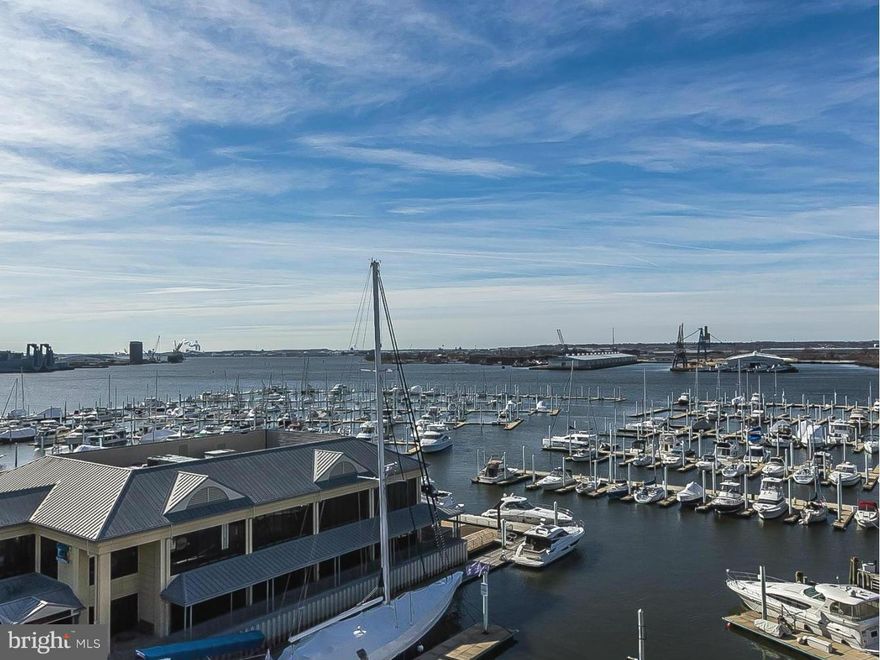 Stunning direct waterfront 3 Br/2Ba condo w/ 2 covered balconies & 2 car pkg.This southwest facing corner residence offers spectacular/panoramic water & city-scape views from all rooms.Features include: hardwood & tile flooring, gourmet kitchen w/ SS appliances & granite counter tops,en-suite Master BR/BA w/ large walk-in closet,upgraded baths,& designer lighting. 24 hr. concierge. Home Warranty.