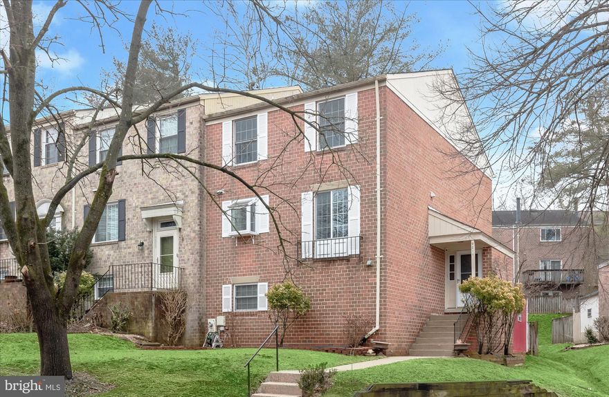 Set in the Village of Kings Contrivance, this three-level brick end-unit townhome blends thoughtful updates with a functional, light-filled layout and a fenced backyard for added privacy.
Inside, the updated kitchen anchors the main level with quartz countertops, stainless steel appliances, and a mosaic tile backsplash that reflects the light beautifully. Table space offers room for casual dining and breakfast, while a double pantry provides generous storage. Just beyond, the dining room connects seamlessly to the spacious living room, where a fireplace creates a warm focal point and a sliding glass door opens to the upper deck for easy indoor-outdoor living. An updated half bath completes the main level.
Upstairs, the generously sized primary bedroom features three closets and a well-designed en-suite bath with a double sink vanity and a private water closet with a tiled shower. Two additional bedrooms share an updated full bath showcasing a stylish vanity, coordinating mirror, and a marbled tile tub/shower surround and flooring.
The finished lower level expands the living space with a family room centered around a second fireplace with brick surround and a sliding glass door leading to the lower deck. A fourth bedroom, full bath, laundry room, and dedicated storage room add flexibility and practicality.
Parking is convenient with one reserved space and additional guest parking available.
Beyond the home, residents enjoy access to the many amenities of Columbia, including parks, trails, community pools, playgrounds, and village centers with shops and restaurants. Nearby destinations such as The Mall in Columbia, Merriweather Post Pavilion, Kings Contrivance Village Center, and Dobbin Center provide convenient shopping, dining, and entertainment options.
Commuters benefit from quick access to major routes including U.S. Route 29, I-95, Route 32, Route 108, and Route 175, offering direct connections to Baltimore, Washington, D.C., BWI Airport, and Fort Meade. Please note: photos depicting furniture have been virtually staged.