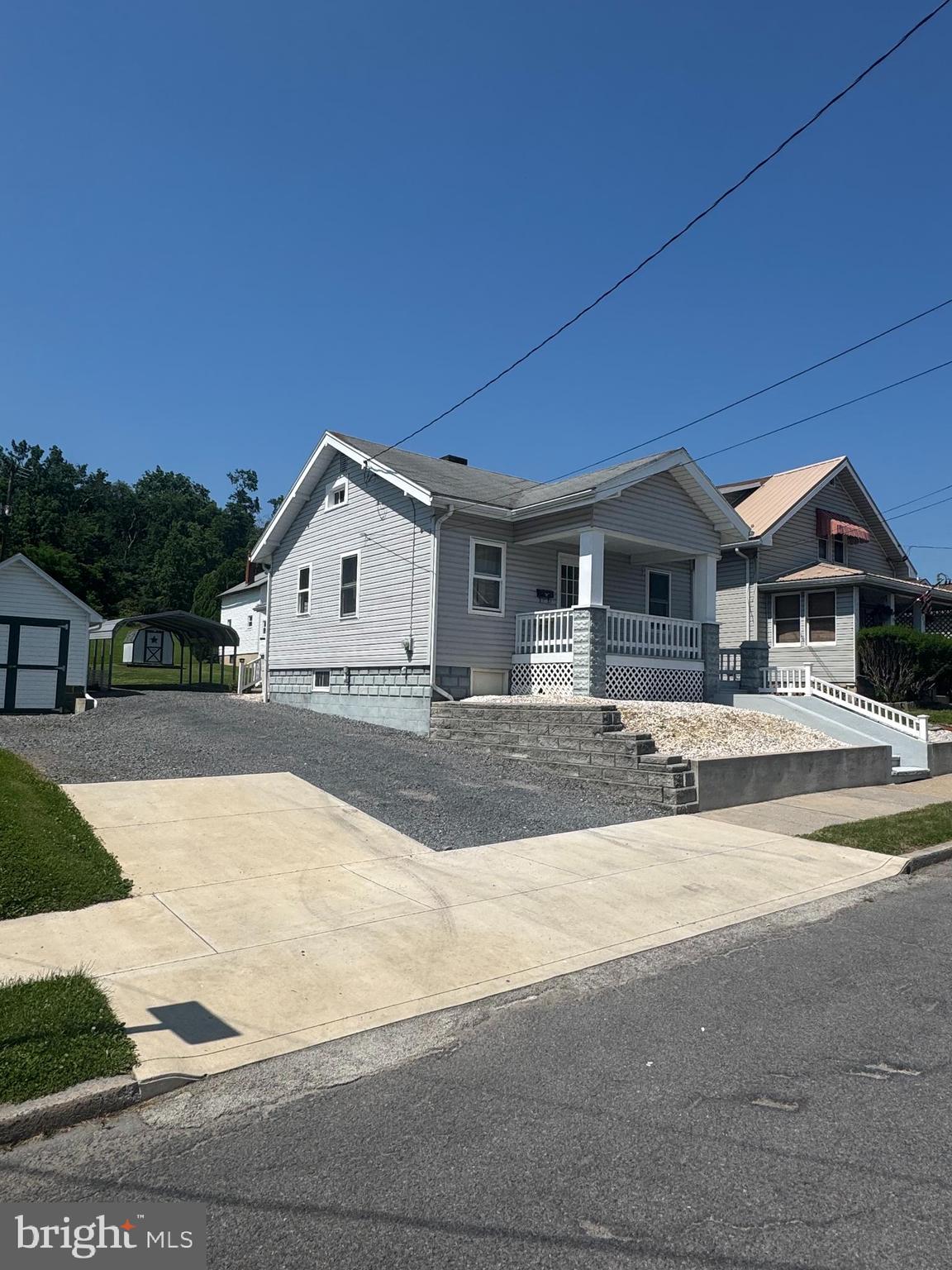 Move right into this cute 2 bedroom Ranch home. Located in a great location, this home will make living an ease. Enjoy the covered front porch, or the covered back porch, included is a carport, a shed for storage. This home has a full basement, off street parking and convenient to amenities.