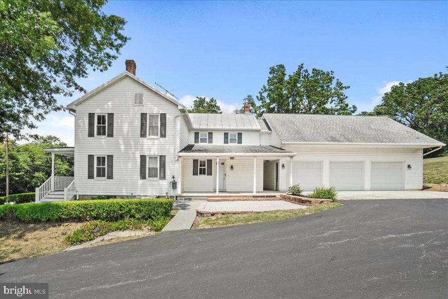 Beautiful Colonial home on 1.63 acres with 4 bedrooms 2 full baths. Gourmet kitchen with granite countertops, double wall ovens, electric cooktop stove and plenty of cabinets and counter prep space. Separate dining room off kitchen. Refinished original wood floors throughout the main level with ceramic floors in kitchen and baths. Laundry on main level in closet in full bath. Primary bedroom with gas fireplace and very large walk in closet. 3 other bedrooms on upper level. Full bath upstairs with jacuzzi tub and separate ceramic surround shower. Walk up attic with plenty of storage space for those holiday decorations etc. Home has a newer pressure tank for well, a UV light on the water and filtration system. Walk out basement with bilco doors. This home not only has a 2 car detached garage, but also has a 3 car garage with garage door openers on all 3 doors, a sink and a wood stove. If you're a car enthusiast, you will love this! There is also a walk up attic in the 3 car garage with electric throughout. Plenty of storage opportunities as well! 2 additional out buildings on the property for lawn equiptment or other uses. Breezeway between garage and home and a patio area. Sit out on the front porch in that rocking chair and enjoy the serenity. Plenty of parking for your guests. Only 2 miles from Frederick County line and Boonsboro school system. Can be on route 70 in 5 minutes