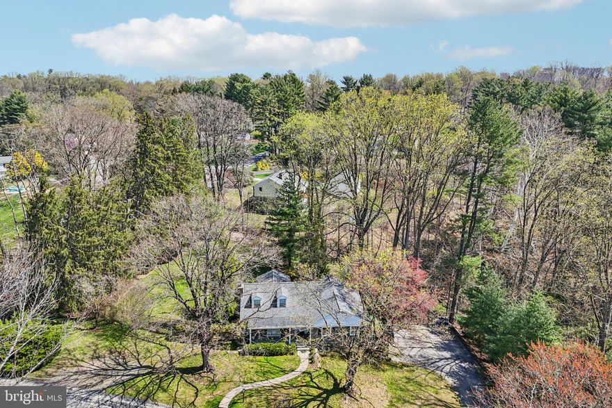 Welcome to 380 Sycamore Mills Rd, a beautiful stone cape home situated on a picturesque 1.1 acre lot in top rated Rose Tree Media school district in Upper Providence Township. This 4 bedroom, 3 bathroom home offers over 3400+ square feet of living space with hardwood flooring on the main level,  a large bright living room with fireplace and picture windows, a spacious dining area that overlooks the eat in chef’s kitchen with ample cabinet space, and an adjacent enclosed sun room that serves as a conservatory for gorgeous plants in the winter and as a breakfast room in the summer, with views of the stunning grounds with specimen trees, a flower garden and much more. Still on the main level the hallway leads to 3 bedrooms: The master bedroom with large closets, a bathroom and sliding doors that open onto a large deck perfect for your morning coffee. The second bedroom has a walk-in closet and its own private bathroom, and the third bedroom has beautiful custom-made wooden shelves, a closet, and a workspace suitable for working remotely.  The third floor is finished with an additional carpeted bedroom. The lower level has a wood paneled private office with its own entrance, built in shelving and cabinets, and a full bathroom with shower. There is also a second kitchen, currently used as a supplies and freezer room, and a bar! There is a game room currently used as a gym, and a large laundry area with wood cabinets, and a storage area with a work bench.  The entire finished lower level has wall to wall carpeting and wood paneling.  Adjacent to the office is a 2-car garage which also has a work bench, and a room with a sink for cleaning up. The exterior is not to be missed and offers extraordinary spaces, including a covered front flagstone porch, and a rear patio with stone walls installed by an Italian mason, a peaceful place to relax, entertain and enjoy views of the woods below. The location cannot be beaten with easy access to the Blue Route (I476) and I95 with fast times to the airport, downtown Philly, the sports stadiums, and the Main Line.  Springton Lake Middle School is up the street, and for outdoor enthusiasts you can drive, cycle or walk in minutes to the bicycle/walking trail in Ridley Creek State Park, visit the Tyler Arboretum, attend summer outdoor concerts at Rose Tree Park, and enjoy the shops and dining of downtown Media and Ellis Preserve in Newtown Square. This is truly the perfect place to call home. Please call for more information or to schedule your private showing today.