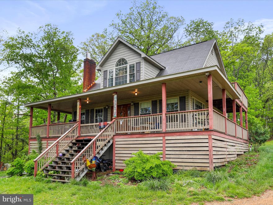 What a great find in Wild, Wonderful,WV ! Large 4 bedroom ,3.5 bath home with mostly finished basement on 50 acres in beautiful Hampshire Co, WV! Property consists of two lots in Barnes Mill Estates which is very lightly restricted with only 4 covenants written into the deed one of which is no commercial businesses. There is no active HOA and you can build up to 5 additional homes on the land should you choose to do so! Many upgrades and newer items including a new outdoor wood boiler, new well pump, pressure tank A/C units. A stream borders one end of the property and there are also some great views! Additionally there is a salt water pool and 25 assorted fruit trees on the property , See this one first and you won't be disappointed !