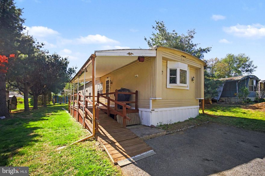 Discover the charm of this delightful 2-bedroom, 1-bathroom manufactured home. Step inside to find a warm and inviting interior featuring a combination kitchen and dining area. The kitchen boasts essential appliances ensuring that your culinary needs are met with ease. The walk-in closet in the master bedroom provides ample storage, while the vinyl flooring adds a touch of modern elegance and easy maintenance. Outside, the property offers convenient driveway parking for up to two vehicles, ensuring that you and your guests always have a place to park. The community atmosphere of Tamarack Mobile Home Park provides a welcoming environment for relaxation and connection with neighbors. Don’t miss the opportunity to make this charming residence your own!