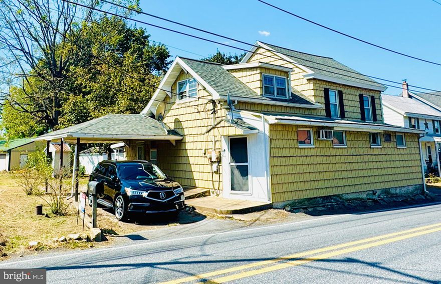 ATTENTION ALL INVESTORS & CONTRACTORS! Looking for a nice project with an open canvas then look no further! Bring your imagination to this large Fleetwood Schools detached 2 story colonial on a little over a half acre basically level lot with a massive 1681 sqft 4 bay pole barn 8 car garage with heat, 200 AMP electric and fully cemented floor. The garage is an auto buff's dream or perfect for the contractor, landscaper or business owner  looking for more space. The 2100 sqft 3 BR house has already been gutted making the rehab and ability to redesign the layout that much easier. A main level primary suite is a possibility and so is a lofted ceiling in the 2nd level or keep the walkup attic as a loft or storage. There is also an enclosed 3 season room, covered patio and carport plus off street parking for 10-12 cars! Utilities are 200 AMP electric, oil hot water heat, electric water heater, public sewer, onsite well and ALL IN AS IS CONDITION! There also is a newer architectural shingle roof. The seller & listing agent make absolutely no representations to the functionality of any utilities, mechanical systems or structural integrities of the property. The entire property is being sold AS IS, WHERE IS! All items in the garage and the equipment and or vehicles on the property do not remain and will be removed prior to closing. Some of the flooring on the main level of the house has been removed so please use extreme caution when viewing the house and enter at your own risk. The 2nd & 3rd levels have flooring and there are stairs to all levels. Please bring a good flashlight for there is no electricity. The property has been recently surveyed with clearly marked pins around the entire property.