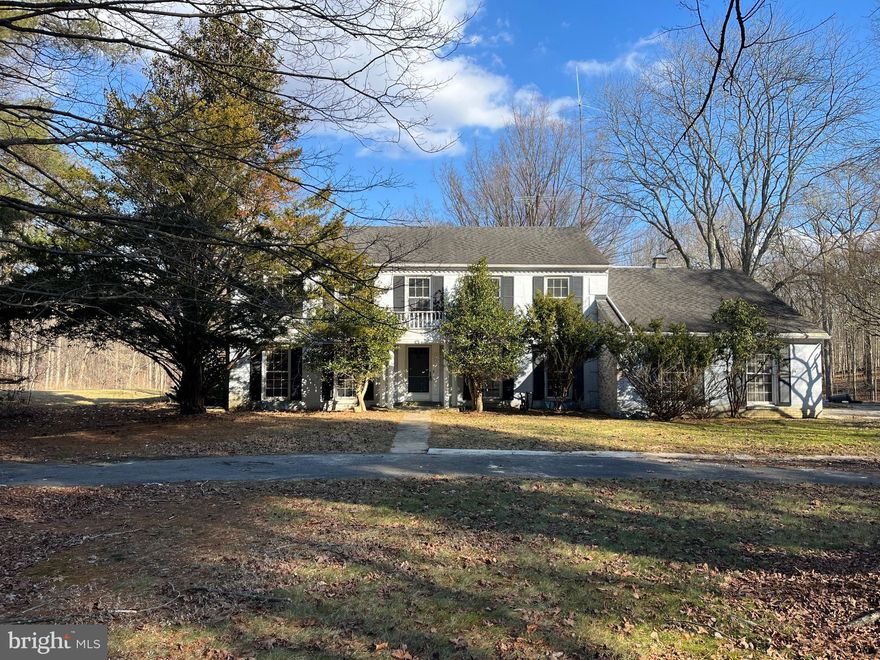 Amazing Opportunity in Goshen Estates.  Three Level Brick Colonial nestled on private, 2.44-acre lot backing to trees and a creek.  Features 5 spacious bedrooms, 2.5 baths, hardwood floors on the main and upper levels, a large eat-in kitchen, office on the main level with built-ins, main level laundry, three wood-burning fireplaces, a large unfinished walk-up basement & a two-car garage. Home awaits your personal renovations…SOLD “AS IS”.   Close to schools, shopping and commuter routes.  Home is priced for condition.    GREAT LOCATION, GREAT LOT, GREAT PRICE!