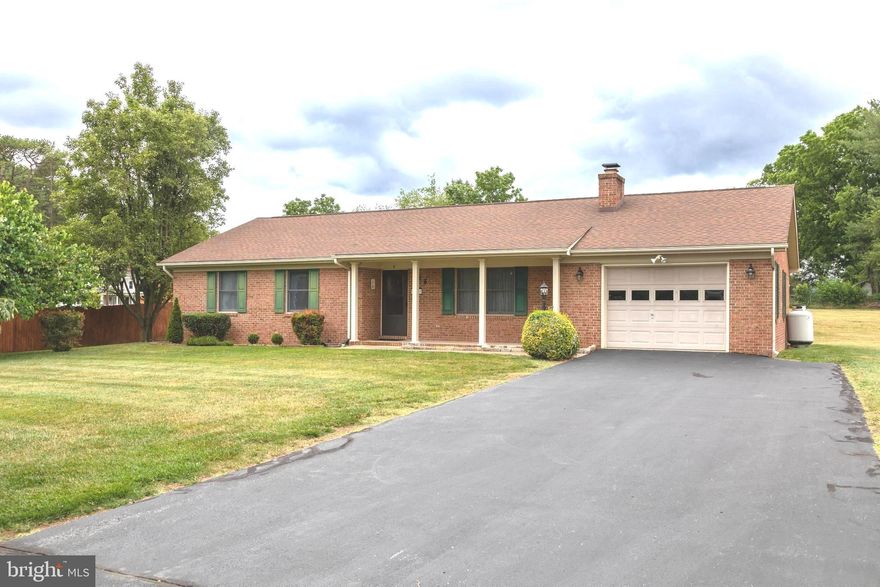 Welcome to the Meadows subdivision, this established sought after neighborhood is minutes from shopping and all the amenities the Town of Luray has to offer!   This well-maintained brick ranch welcomes you with 3 bedrooms and 1 1/2 bath. The kitchen has beautiful oak cabinets, with a separate dining room to host your family dinners.  Off of the kitchen there is a large laundry/mudroom.  You will find laminate wood floors throughout the bedrooms, hallway, and living room.  The living room boast of a large fireplace with propane logs.  There's plenty of room to entertain outside, with a deck right off the kitchen area.    A large, level open lot gives you so many options to create your own outdoor oasis.  Come see today, this home has been meticulously cared for and loved throughout the years and is waiting for you to call it home!