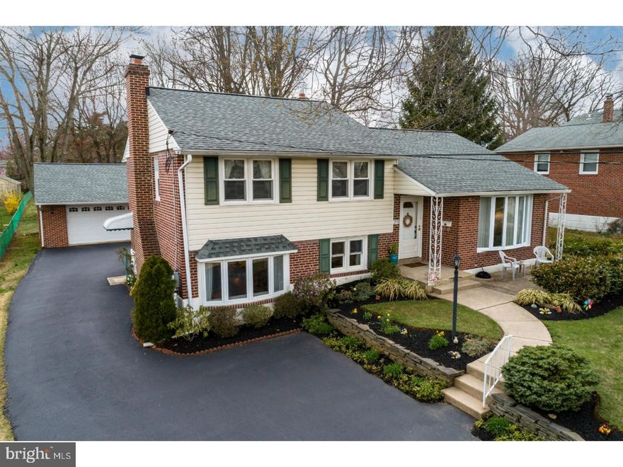 Located on what is arguably one of the best lots in Broomall, this oversized, flat yard with a 2 car detached garage is a rare find!   This home is an easy sidewalk stroll away from local shopping, schools, parks, and public transportation. The sun-filled main level with hardwood floors offers classic character in its formal living and dining areas. Eat in kitchen provides ample cabinet space, newer appliances and a spacious and bright eating area overlooking the private, level, quiet back yard.  This lovely yard can also be enjoyed from the cheerful 3 Season Sunroom.   Three sizable bedrooms, all with gleaming hardwood floors.   Lower level offers a cozy family room with brick wall fireplace, laundry room and powder room to complete this space.  A true, meticulously maintained home from the inside out.   This one-of-a-kind property will not last, so make your appointment today! Buy with confidence, home has been pre-inspected.