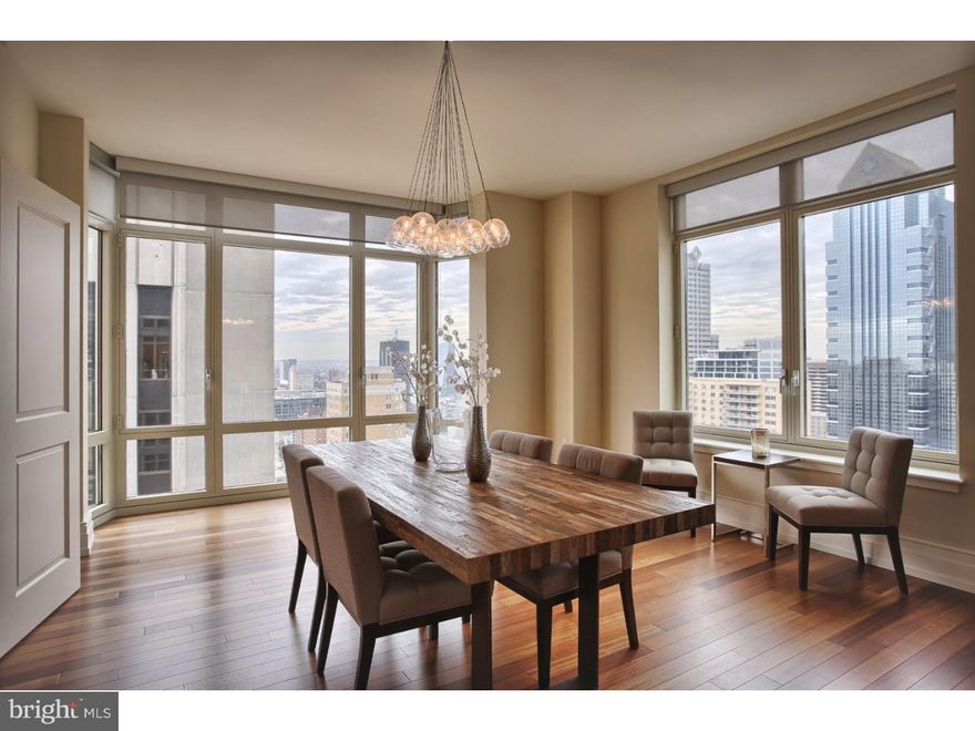 State-of-the-art amenities meets unparalleled luxury at 10 Rittenhouse Square! Located on the 26th floor, this 2 bedroom, 2.5 bathroom home offers dramatic views of the Philadelphia skyline to the North, South, and West! Enter the home to a beautiful foyer which leads you to the great open floor plan with living room and dining area. The kitchen's clean lines and smooth surfaces create a modern look with European simplicity that is enhanced with granite counters, a sitting area, and high end appliances. In the master bedroom you will find two large walk-in closets, a balcony to enjoy the outdoors, a large master bathroom with his and her sinks, soaking tub and separate shower. The second bedroom also hosts it's own bathroom and plenty of storage space. 1 car parking is included with the home and there is 5 years left on the tax abatement! Hosting this stunning residence, the 10 Rittenhouse luxury building, designed by world-renowned architect Robert A. M. Stern,  provides marble floors and Venetian plaster walls. The formal oval entry lobby creates a grand overture to the amenities and residences that lay beyond. Behind the front desk, a white glove concierge waits to greet your guests, accept deliveries and assist you with any request imaginable including a chauffeured Mercedes available at your convenience, fitness center, boardroom, business center, indoor lap pool, library, wine storage, catering kitchen, courtyard, yoga room, party room, garden deck and sauna. A one bedroom guest suite is also available to reserve for an extra fee for your out of town visitors. An additional private entrance directly on Rittenhouse Square provides the ultimate in prestige and convenience.
