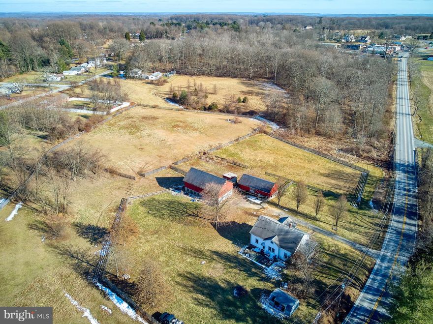 With over 13 acres, a farmhouse, and two barns, this property creates a huge opportunity for those looking to build equity with renovation and potential subdivision! While farmhouse needs full renovation, Seller has already demolished most of interior, and a provided new HVAC system & water heater (Buyers will need to have professionally hooked up)! 500 Gallon Propane tank (owned) recently added with line ran up to exterior of house for new homeowner to connect! Construction Loan or Cash preferred, please confirm with lender the property condition prior to submitting an offer.