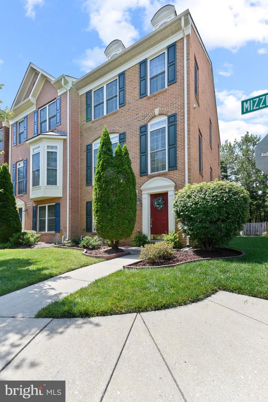 OPEN SUN 1-3 PM! This is the one you have been waiting for! Tucked away in the secluded community of Admiral's View, this  move in ready 3 BR, 2 Full and 2 Half Bath End Unit (with front AND side brick)  stands out amongst the rest.  Boasting 9' ceilings, extra windows, 2 fireplaces, gleaming hardwood flooring  in excellent condition , custom plantation shutters on all windows, large gourmet Kitchen with granite center island & countertops, stainless appliances, new wall oven, room for large table/chairs and slider to deck with wooded views.  Enter through the lowest level to the stunning Foyer with French doors that open to the  Den/Office with gas fireplace followed by 1/2 BA and garage entrance. The upper main level features the oversized  Great Room with 1/2 BA,  wainscoting and crown moldings and can accommodate large furniture pieces.  The upper top level features the Owner's Suite that is quite large with tray ceiling, additional windows, nice super Bath and large walk in closet, as well as 2 additional BR's and Hall Bath.  The garage is big  enough for 2 cars and includes parking pad for 2 cars as well as tons of additional storage.  This is an exceptional Annapolis location close Riva Rd and Rt. 2 highway exits., the Annapolis Towne Center and just a short drive to Downtown Annapolis. TV and soundbar over fireplace in Kitchen conveys.