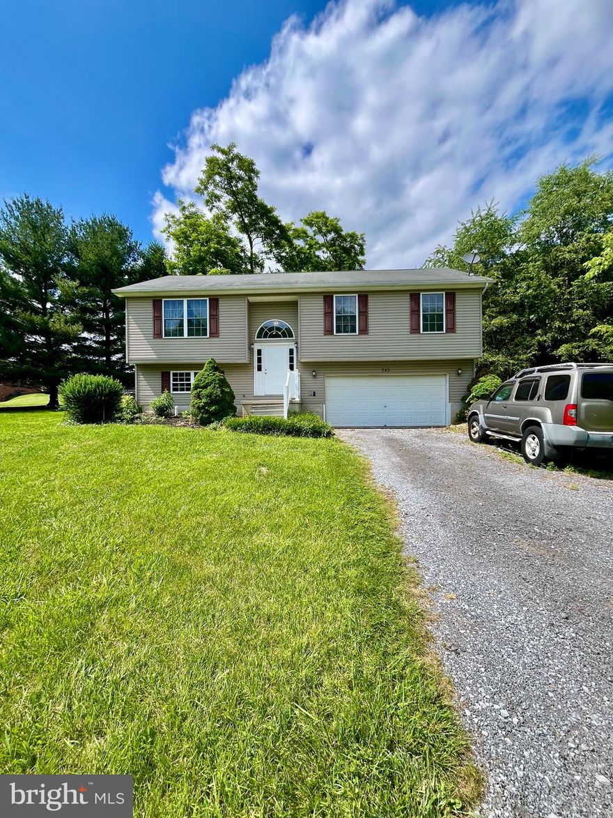 Spacious split foyer ready for it's next owner! All nestled in on 1 acre of flat land, offering privacy and room for the kids and/or animals to run. Great sized kitchen with a dining room attached, where you'll have access to your back deck and back yard. 3 Bedrooms on the main level and 2 full baths. Basement is fully finished with a half bath, currently being used for a Primary bedroom but could also be a great rec room for the family to spend time in. Laundry room is in the half bath in the basement. 2 car garage attached! There is also a shed for extra storage space or to put all your lawn care necessities in. Come check out this peaceful oasis and make it yours!