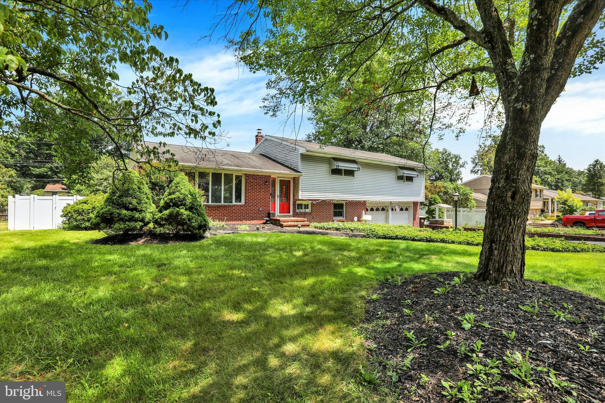 OPEN HOUSES THIS SATURDAY (8/2) FROM 1-5PM & SUNDAY (8/3) FROM 1-3PM! Welcome to 9 Houston Road, where classic charm meets bold, modern living in one of Yardley’s most picturesque neighborhoods. This refreshed 4-bedroom, 2.5-bathroom home is anything but ordinary. From the moment you pull up, the stunning brick exterior and professional landscaping catch your eye. Step inside the foyer and be instantly struck by the transformation; walls have been thoughtfully removed to create an open, sun-drenched main living space that flows effortlessly from one area to the next. Perfect for lively gatherings or quiet mornings, the reimagined floor plan feels both expansive and intimate. The kitchen, now updated with new flooring and better connectivity to the rest of the home, offers a warm yet functional hub with generous cabinetry and natural light pouring in. Dining room and family room complete this spacious main level boasting hardwood floors, plenty of windows, and ample space for entertaining or relaxing after a long day. Downstairs, a refreshed sunroom invites you to unwind while overlooking your private backyard oasis. With new flooring and panoramic views of the sparkling in-ground pool, this space will quickly become a favorite retreat. The cozy family room offers the perfect spot to curl up with a book or binge your favorite show, while the large laundry room and powder room add everyday convenience, and also offers access to a substantial crawlspace for extra storage. Upstairs, what was once a three-bedroom layout has been transformed with the addition of a true fourth bedroom; ideal for guests, a home office, or a growing household. The primary suite features an upgraded en-suite bath that’s been tastefully modernized, while the remaining bedrooms offer great space and comfort, each with ample closet storage and natural light. Fresh interior paint gives the home a crisp, polished feel, ready for your personal touch. The oversized two-car garage provides plenty of space for vehicles, tools, and toys. But the real showstopper? Step outside to your own private paradise. The in-ground pool has been professionally opened and is sparkling blue. Imagine the summer parties, weekend lounging, and late-night swims. Extensive, high-quality landscaping adds drama and beauty to every corner of the yard, turning the outdoors into a living canvas. Perfectly located just minutes from the river towns of New Hope and Yardley Boro, with quick access to shops, restaurants, regional rail, and commuter routes, 9 Houston Road is more than a home; it’s a lifestyle upgrade. Stylish, spacious, and thoroughly reimagined, this is one property you don’t want to miss. Schedule your private tour and prepare to fall in love.