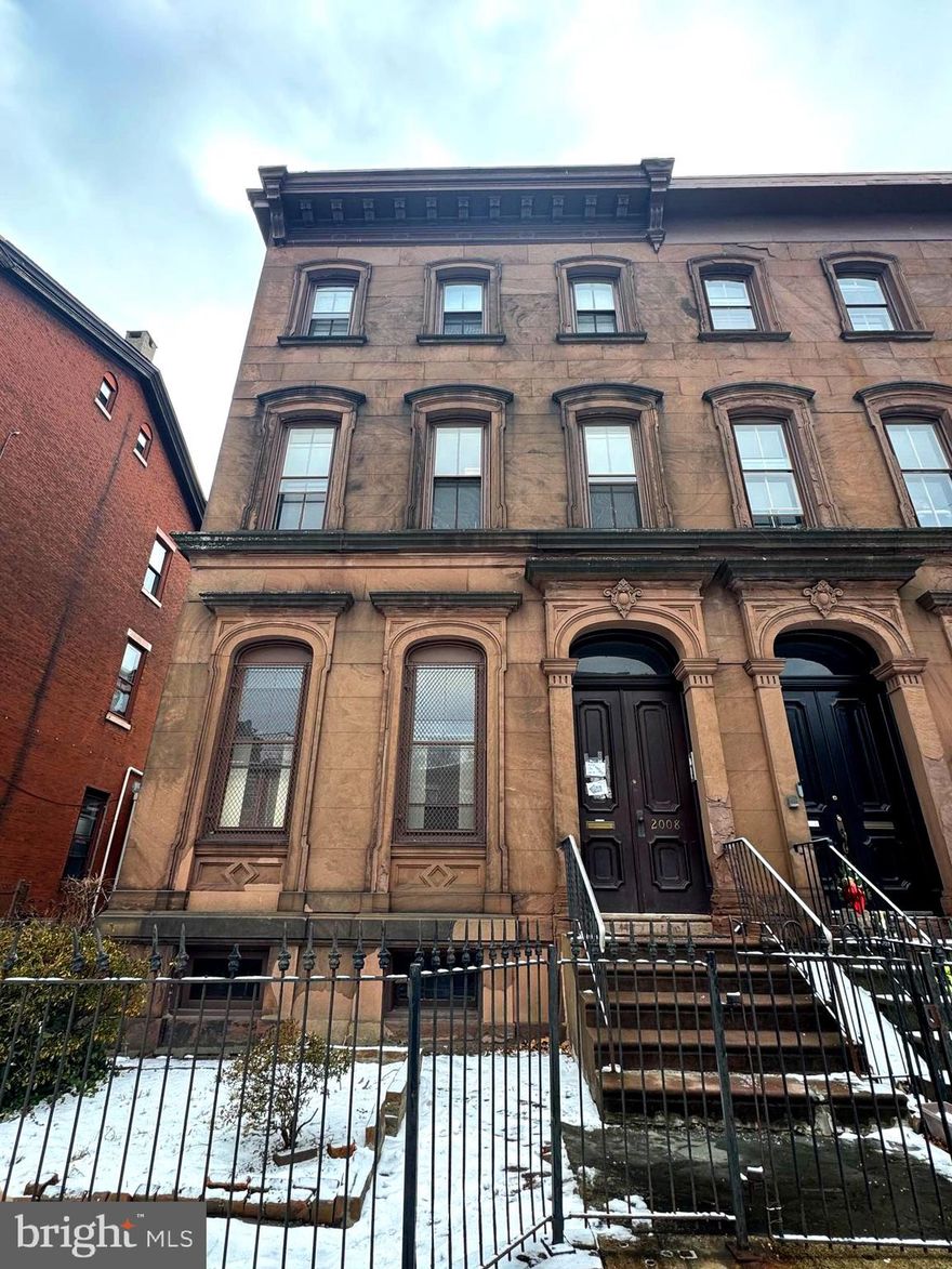 Introducing a magnificent brownstone situated on a 31.5' x 200' RM-1 street-to-street parcel in the vibrant Francisville neighborhood. 2008 West Girard is a premium turnkey, fully stabilized 6-unit multifamily building with unique charm and character. The property includes a 31.5' x 95' rear vacant lot nestled within view of Girard College and in close proximity to shops and restaurants. The property will be delivered fully leased and offers steady cash flow and opportunity for development on the rear portion of the land.