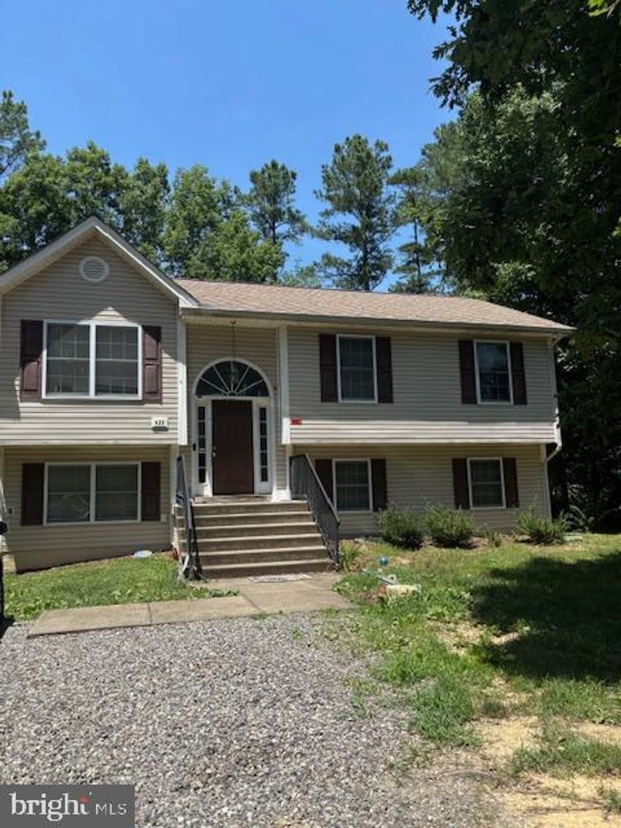 Welcome to 439 Cornwall Drive, a fantastic opportunity in the amenity-rich, gated community of Lake Land’Or! This split-level home offers a flexible layout with a finished basement which includes a 4th bedroom, a bonus/game/rec room and room to customize for your needs. 

Inside, you'll find an open main living area and a well-equipped kitchen. The home offers great potential and just needs a little TLC to truly shine—perfect for investors or buyers looking to build equity (home is being sold in as-in condition). 

Enjoy peace of mind with a brand-new HVAC system installed in August 2024 and  all the perks of community living—lake access, a clubhouse, community pool, fitness center, basketball courts, walking trails, and more.

Situated in a great location, this home is just a short drive to I-95, making commuting to Richmond or Fredericksburg easy and convenient. Experience the perfect blend of comfort, community, and opportunity—all in a serene lake community setting.