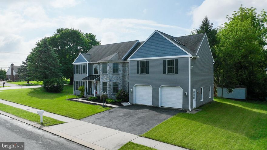Welcome to this charming 4-bedroom, 3-bathroom residence, situated on a corner lot in a quiet Conestoga Valley neighborhood, boasting over 36,00 square feet. Conveniently located near major highways, Tanger and Rockville outlets, restaurants, and entertainment venues. Upon entering, you'll be greeted by a two-story open foyer featuring beautiful hardwood, an inviting dining room with a tray ceiling, larger windows, and an abundance of natural light. Additional features include an office/study room and powder room with tile flooring, granite vanity top, and a stunning two-story family room with a gas fireplace, plentiful natural light, and adjacent breakfast nook. The kitchen is equally impressive, boasting upgraded granite countertops, backsplash, tile flooring, ample storage, stainless appliances, and a built-in double oven. A mudroom with a sink leads to an oversized, heated two-car garage with access to the outside yard. An impressive open staircase leads to the upper level, where you'll find four generously sized bedrooms, two full bathrooms, a laundry room, and a newly installed laundry system. The luxurious owner's suite features a built-in fireplace, two large walk-in closets, a whirlpool tub, two separate sinks, tile flooring, skylights, recessed lighting, and a built-in fan. Imagine unwinding after a long day in the soaking tub, or relaxing by the fireplace with a warm cup of coffee or your favorite beverage. The finished lower level boasts built-in shelves, perfect for creating a home movie theater, gym, or play area. With plenty of storage space and two convenient entrances to the outside deck, this residence is ideal for family gatherings, cookouts, and outdoor entertaining. A shed is also provided for storing outdoor tools and equipment.  Don't miss your chance to own one of the most stunning property in the neighborhood. 
Schedule private tour today!