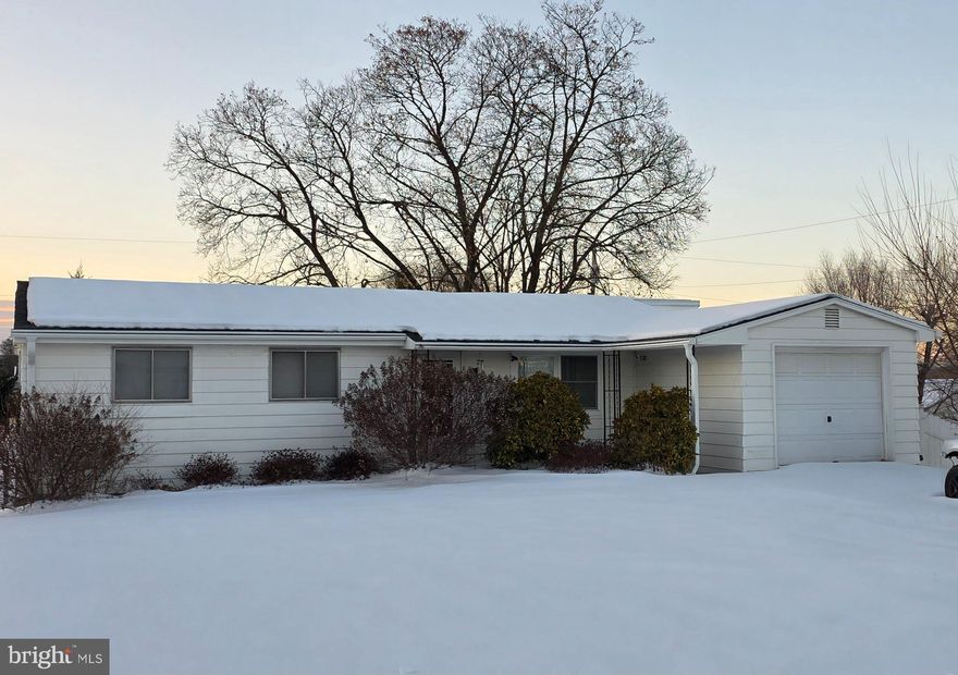 COMING SOON!! 
Welcome home to 125 Richard Street in Martinsburg. This inviting 3-bedroom, 2.5-bath rancher offers a functional layout with hardwood flooring throughout the main living areas. The living room provides a comfortable gathering space and leads into the eat-in kitchen with ample room for daily meals. 
All three bedrooms are located on the main level and feature carpeted flooring, along with a conveniently located hall bath. One bedroom also includes a private attached half bath. 
The finished basement adds valuable living space with a large family/rec room, a full bath, and two bonus rooms ideal for a home office, hobby room, or guest space. The lower level also includes a large storage area that previously served as a 2-car garage, providing excellent storage or workshop potential. Additional features include 200-amp electric service, a one-car garage, and a covered side porch with all new windows. 
Outside, enjoy a spacious, fully fenced backyard with a 6-foot vinyl privacy fence, pool, covered concrete patio, and two storage sheds—perfect for relaxing or hosting gatherings. 
Located close to Route 11, with easy access to shopping, dining, and entertainment options nearby. This home offers space, functionality, and comfort both inside and out. Don’t miss your chance to make it yours!
Professional photos to come.