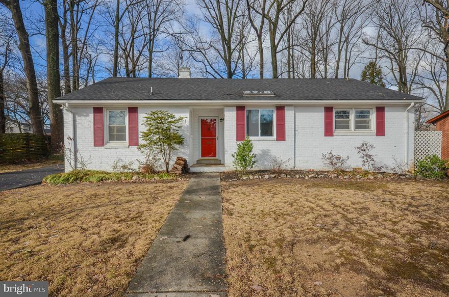 Wonderfully updated home, near Rockville Town Center, on quiet street!  This 1,653 sq ft home features 3 bedrooms and 2.5 bathrooms, boasting hardwood floors, built-ins, and skylights.  Your combination living/dining room has a cozy wood burning fireplace, ample natural light, lovely bay window, and a bonus area with skylight perfect for reading or relaxing, and a powder room.  Through the dining room is your spacious kitchen with newer appliances, updated fixtures, and an abundance of cabinet and counter space.  Directly off the kitchen is a gorgeous family room with wood burning fireplace and exposed brick wall.  Your MASTER SUITE boasts enormous walk-in closets with shelving and private full bathroom with tile shower, ceramic tile flooring, and dual vanities with quartz countertops.  Completing this house are 2 large bedrooms with built-in closet shelving  providing ample storage space, and an updated hall bathroom with tile shower, ceramic tile flooring, and vanity with quartz top.  Located on nearly .3 acres, your outside space has an oversized 2 car garage and double carport, and an lavish outdoor OASIS that  is perfect for relaxing or hosting gatherings in your huge enclosed porch with ceiling fan and FULLY fenced backyard.  Located steps to restaurants, shopping, and less than 1 mile from Rockville Metro Station.  Home has a lead paint free certificate. Pets OK with $50 monthly pet rent per pet. Good credit required.