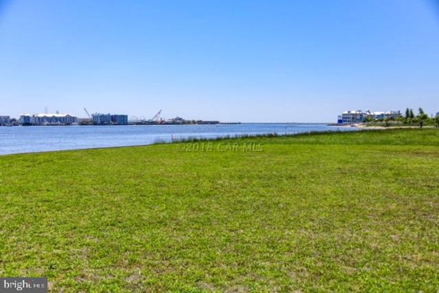 DREAM HOME LOCATION!!!! STOP! COME WALK THE LOT and look at this beautiful direct bay front lot with the inlet as the backdrop!  WOW SELLER PAID $975,000 he wants it SOLD NOW ONLY $724,900 for this amazing location.  Build your dream house on lot 4 at the Estates at Inlet Isle and enjoy open Bay views. This lot will accommodate a large home and as one of the biggest lots and can accommodate a large boat.There is a deep water slip  that can accommodate a 40 ft boat providing easy access to the ocean.  The lot has the potential for an additional pier as well.  Build and enjoy your showcase waterfront home for years to come! If you are not ready to build that dream home yet, buy the land and hold it. Once it's gone, it's gone...  LOCATION! LOCATION! LOCATION! Imagine your dream home built close to world class Marinas, Fishing, Golf Courses, Assateague Island, Ocean City Boardwalk, and Restaurants. Your family and friends are sure to make memories that last a lifetime here. Come take a look at this dream home location and live the lifestyle!