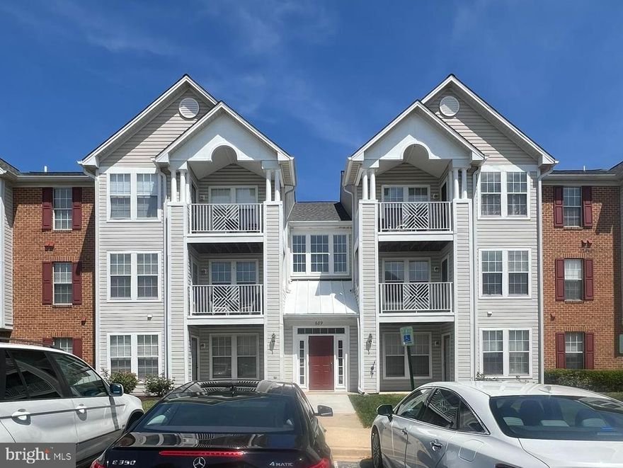 Beautiful mid level condo featuring wood flooring throughout in Piney Orchard.  Bright and sunny open concept floor plan with 2 bedrooms suites.  This condo features a huge living room/dining room with french door to balcony.  Gorgeous kitchen with granite counters, stainless steel appliances and breakfast bar.  Primary bedroom suite features attached full bathroom and walk in closet along with built ins and window seat with storage.   2nd bedroom suite has access to dual entry full bathroom. Separate laundry room with full size washer and dryer plus some storage.  Many community amenities include pools, recreation center, jog/bike paths, tennis courts, playgrounds. Conveniently located to schools, shopping, MARC station, NSA, Ft Meade, Annapolis, Baltimore, and D.Cl, major highways.