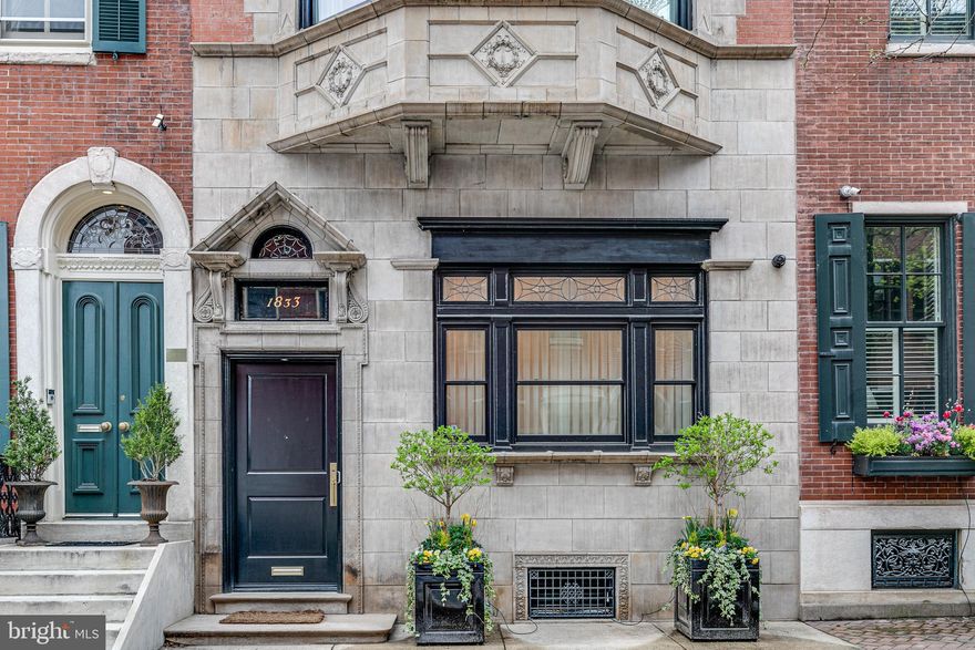 Indulge in the epitome of luxury living at 1833 Delancey Place, an exquisite masterpiece nestled just moments away from Philadelphia's iconic Rittenhouse Square park. This immaculate 5-bedroom, 4.5-bathroom residence spans over 5000 square feet across 5 meticulously designed levels, showcasing the perfect fusion of timeless elegance and modern opulence. Meticulously curated by a dream team of designers, architects, and master craftsmen, this home is a testament to unrivaled quality and sophistication.

Stepping into the impressive entry vestibule, you are greeted by a seamless blend of historic charm and contemporary allure. Beyond the French doors lies a grand formal living room and dining room, adorned with high ceilings, white oak herringbone floors, and a captivating gas-burning fireplace. Custom built-ins, complete with beverage refrigeration and an ice maker, add a touch of convenience and luxury. Natural light gracefully dances through the south-facing window, accentuating the sheer elegance of the space.

The eat-in kitchen is a true masterpiece, designed to captivate the senses. Impeccable marble countertops adorn the generous island, providing a gathering place for culinary delights. Top-of-the-line appliances, including a side-by-side 36'' Sub-Zero Refrigerator and 24'' Freezer, elevate the art of cooking. Custom-milled cabinetry, multiple pantries, and a custom hood vent create a harmonious balance between form and function.

Ascending to the second level, the Primary bedroom suite awaits, spanning the entire front of the property. Bathed in natural light from the gracious bay window, this tranquil haven offers breathtaking views of Delancey Place. An adjacent walk-in wardrobe and an en-suite bathroom, adorned with radiant heat mosaic marble floors, an oversized seamless glass shower, a double marble-top vanity, and a private water closet, provide the ultimate indulgence. Completing this level is an additional dressing room, meticulously designed with custom shelving, plus a delightful family room, complete with a built-in beverage center.


The third level presents two generously proportioned bedrooms. The front bedroom boasts a walk-in closet, two additional custom closets, and a built-in reading nook. Its en-suite bathroom features a large single vanity with a marble top, a tub/shower combo, and a separate linen closet. The north-facing bedroom offers two custom-milled wardrobes and is conveniently located adjacent to the hall bathroom. A full laundry room, equipped with an Electrolux washer and dryer, a sink, and ample storage, ensures effortless functionality on this level.

Venturing to the sky-lit fourth level, you will discover two additional bedrooms, a bathroom adorned with a single vanity and a glass-enclosed shower, and access to the enchanting terrace. This rooftop oasis grants panoramic views of the city skyline, where outdoor entertainment and relaxation intertwine seamlessly. The outdoor kitchen and built-in speakers elevate this space into the realm of urban serenity.

Descend to the lower level, where luxury meets convenience. Indulge in the state-of-the-art wine cellar, sculpt your body in the home gym, equipped with the cutting-edge Isawall exercise system, and revel in ample storage space. A mudroom and a 2-car garage offer effortless functionality, ensuring that every aspect of your lifestyle is catered to.

This remarkable home is equipped with a fully restored vintage elevator, seamlessly connecting all four floors, while the top-line home automation and security systems guarantee peace of mind. The multi-zoned HVAC system ensures comfort throughout, while the remaining 7 years on the tax abatement add to the allure of this trophy residence.

Welcome to a life of unparalleled luxury at 1833 Delancey Place, where every detail has been carefully crafted to exceed your expectations.