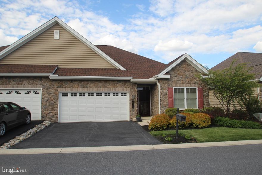 This beautiful home in Traditions of America Lititz comes with a lifestyle that you'll want to embrace. From tennis and bocce ball to the outdoor pool, relaxing at the fountain and gazebo, walking and biking the paths, the amazing Clubhouse inside and out will be the place to meet friends, sit around a fire, play games or enjoy a relaxing drink. The award winning Adams floor plan will delight you  with Hardwood floors in all main living areas and bedroom #2, ceramic tile bathrooms and open vaulted spaces. The super room/4 season room extends across the rear of the home offering large  windows and even a circle head window -  all to create a  bright space that is open to the cathedral great room with gas fireplace(includes a blower fan). The  spacious white cabinetry kitchen offers granite tops, upgraded cabinetry with pull out trays and upgraded appliances like a Meile Dishwasher( all the appliances stay) plus a stunning subway tile backsplash. Pull up a stool to the island or enjoy the dining area large enough to seat 8 and still have a buffet, server,  or your personal furniture preference. Not a cookie cutter home this one features 2 tray ceilings, crown molding, a built-in niche to display a favorite piece of art,  a window seat in Primary Bedroom and 3 ceiling fans .  Great closet space and ample storage included. An upgraded Kinetico water softener system means great water as well as the Aprilaire air purifying system  for less allergens and dust. Walk up attic storage over garage is a welcome perk! The budget friendly natural gas heat keeps you warm and comfortable year round. Home is located one block from the community Clubhouse and gazebo plus close to shopping and medical facilities. More photos soon. Get your showing scheduled now!