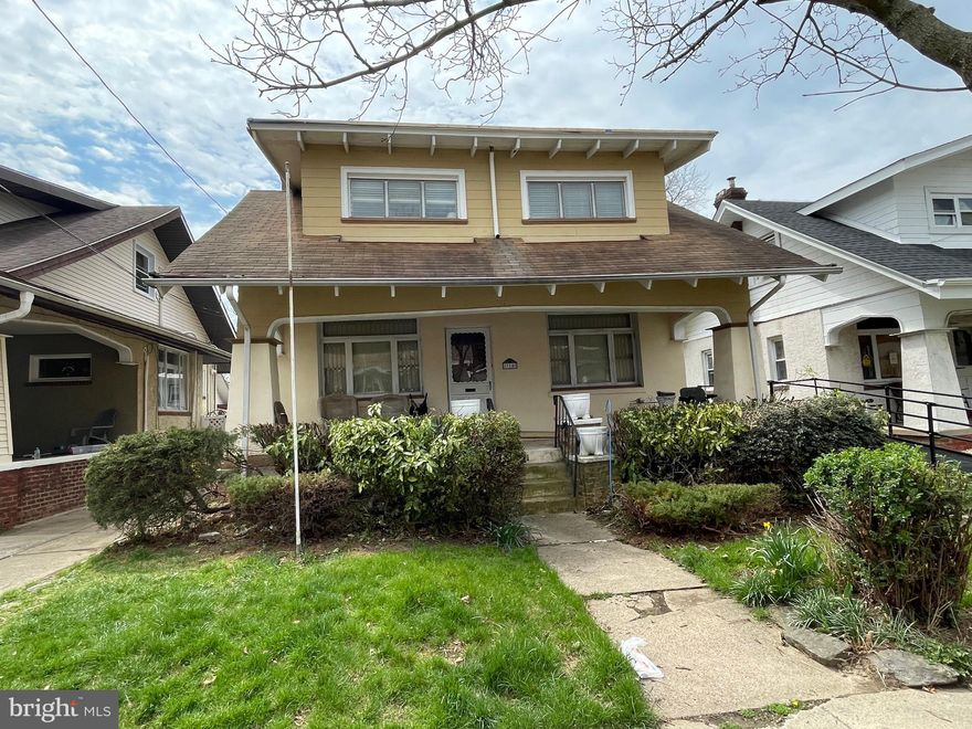 Roll up your sleeves to make this your home...... the way you want it. This is a rare opportunity to get into a Craftsman style home in the Fox Chase section of Philadelphia: off street parking, a covered front porch, a fenced yard, two car garage, and many interior architectural features still intact that will enhance your finished renovations. This sale is "as is".
