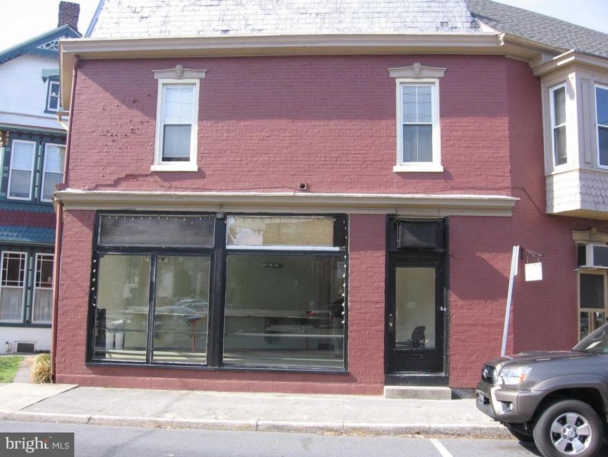 Convenient location for office or retail use. Large display windows.