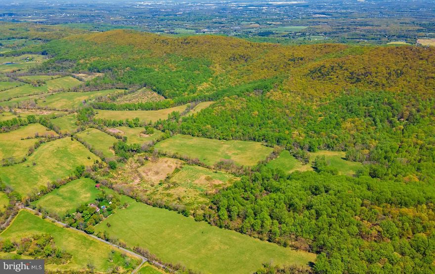 345 Total Acres in 2 parcels, Tax ID#7011-68-5387-000 with 301.0774 Acres and Tax ID# 7011-98-3358-000 with 44.212 Acres. This land is in a Virginia Outdoors Foundation Easement, which prohibits all building above the 750' contour line. (See the Easement in the Documents section.) The 44 Acre parcel cannot be sold separately, and it is part of the Bull Run Mountain Range. A separate Deed Restriction prohibits: hunting, fishing and trapping on this property.