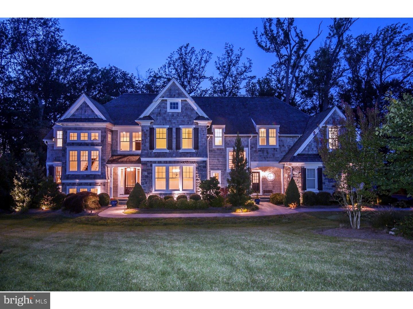 Magnificent home custom designed by Ann Capron in the award winning community of "Springhouse", nestled in one of the area's finest estate settings. This classic and timeless stone and cedar shake styled home is perfectly situated on a 1.6 acre homesite and includes a finished walk out Lower Level opening to tiered bluestone patio's, pool, spa and waterfall. A custom wood & glass front door welcomes you to a gracious Foyer accented by a stunning stair tower, a 6' wide cherry stair and with window seated landing. Well proportioned formal rooms are highlighted with detailed millwork and ten foot ceilings. A dazzling state of the art gourmet Kitchen features a 12 foot island & Kountry Kraft cabinetry extending to a bead board ceiling, and includes every imaginable amenity - Thermador 6 burner cooktop with griddle and warming drawer, Double Jenn air ovens, Sub zero Refrigerator, microwave, two Bosch dishwashers, Kitchen Aid trash compactor. Adjoining spacious Morning Room features wall of French doors out to mahogany deck, with circular stairs down to patio. Butler's Pantry includes wine storage and ice maker, and opens to a holiday sized Dining Room with wainscoting and crown molding. Exquisite millwork and moldings throughout, plus wide plank cherry hardwoods. Oversized Living Room with expanded alcove features gas fireplace and full wall bookcases. Stunning Family Room features stone fireplace and custom wood trussed cathedral ceiling, built in entertainment center, and French doors to deck. The Family entrance includes a Mud Room with flagstone floor, cubbies and planning desk, Powder Room, walk in pantry and backstairs to both second floor and lower level. The Mater Suite features a cathedral ceiling, window wall with tree top views and two separate Master Baths, the ultimate in luxury and privacy. The Lower Level features a huge entertainment area opening to patio and pool, separate Playroom, Full bath with Changing Area and door to pool area, 6th bedroom, and unfinished storage space with double door entry for storage & rough plumbing for another laundry area. The home has a casual elegance and provides every amenity for entertaining and everyday living. Centrally located just minutes from the areas finest country clubs and private school, Rte 476 and 202. A Perfect for the discriminating Buyer in search of something special.