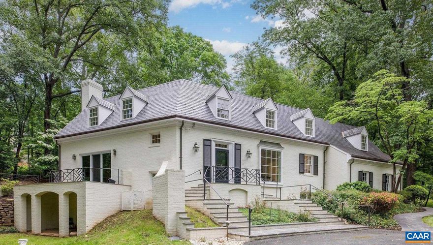 Open Saturday 2-4 and Sunday 12-2, this architecturally distinguished brick and slate Ednam Forest 4 bedroom/4 bath offers original charms paired with stunning, classic kitchen and bath renovations.  Now with beautiful hardwoods throughout, carrera marble bathrooms and kitchen, the home is 100% move-in ready.  Fireplaces in the living and family rooms, gracious slate-floored foyer, expansive bluestone rear terraces.  7 minute walk to Boar's Head Inn and Sports Club amenities.  Interior photos on May 15.  Showings commence 5/15 too.,Marble Counter,Painted Cabinets,Fireplace in Family Room,Fireplace in Living Room