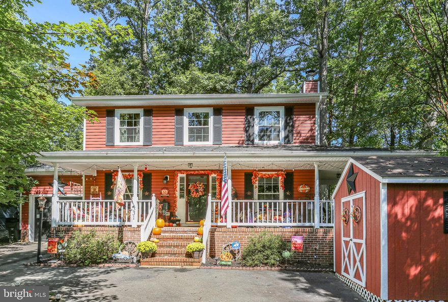 Welcome to this beautifully maintained 3-bedroom, 2.5-bath Colonial nestled on a premium lot overlooking the golf course. This classic home offers timeless curb appeal with its expansive wrap-around front porch—perfect for morning coffee or evening relaxation. Step inside to find a spacious, light-filled interior featuring a traditional layout.  The main level includes a welcoming living room with wood burning fireplace, formal dining area, and a cozy family room with lots of windows and skylights—ideal for gatherings. The kitchen boasts ample cabinetry, stainless steel appliances, and a breakfast room.  Upstairs, you'll find three generously sized bedrooms, including a primary suite with an en-suite bath. Outside, enjoy the peaceful setting from your rear deck—perfect for entertaining or simply taking in the scenic golf course views of the 17th hole.   A private, gated, secured community, Lake of the Woods offers  everything you could possibly want. Home to two lakes,  a golf course, an equestrian center, a fire and rescue department, all within the gates, Whether you enjoy boating, waterskiing, kayaking, golfing, horseback riding,  a delicious meal at the clubhouse,  or enjoying one of the beaches, you won't be disappointed!  Don’t miss the opportunity to own this one-of-a-kind home where charm, comfort, and location come together beautifully!