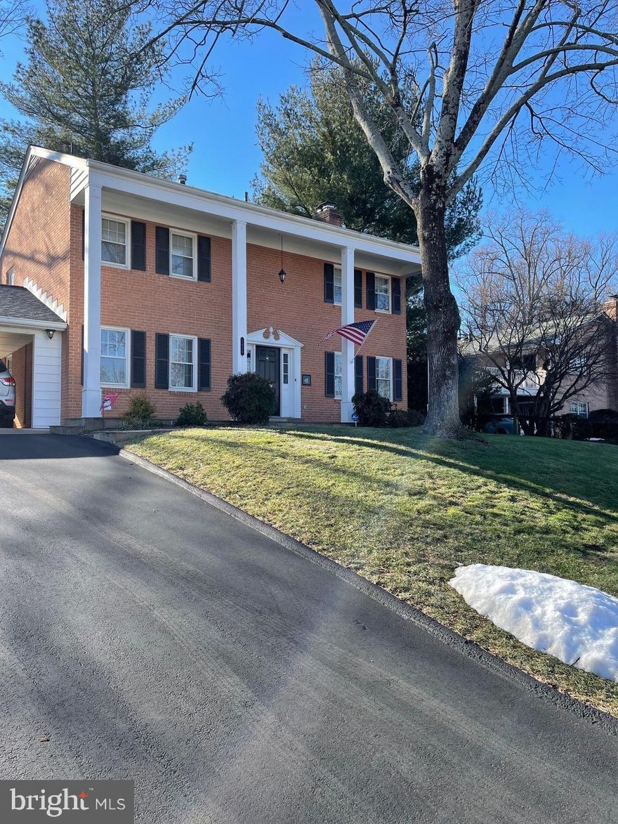 Offering: 2620 Woodley Place in Falls Church, VA. Sitting high above Falls Church (in Fairfax County) within Walnut Grove neighborhood, this brick home is wonderfully convenient to so many areas of interest with multiple routes available to each one. It’s in a highly walkable area with sidewalks and connections to Washington & Old Dominion (W&OD) trail for biking, walking, or running. Multiple Fairfax County and City of Falls Church parks are available within a short distance. Azaleas and cherry blossoms abound in the spring, blueberries in the side yard can be harvested in June, crape myrtles bloom in late-summer, and then turning leaves dazzle in autumn. Specs: This house has 2, 052 sq ft above grade living space, 500+ sq ft finished in basement, and has four upstairs bedrooms (three nicely-sized and one smaller, approximately 100 sq ft in size) and 2.5 bathrooms. It has solid white oak flooring on the first and second levels with a move-in ready finish. Two second-level bedrooms are carpeted over the hardwood, while the primary and small bedroom are hardwood like the upstairs hall and main level. Lot size: 10,098 sq ft. Annual real estate taxes are $10,400 (Fairfax County rate is lower than City of Falls Church) and there isn’t an HOA. Other Information: The small bedroom has been converted to an office, which is great for remote work (desk and hutch can convey), and is without a closet (the space was repurposed as a walk-in closet for use as a second in the primary bedroom). This bedroom can be kept as an office or used as a cozy bedroom, nursery, den, or sitting room). There’s also a generous 2-car carport that includes a large, locked storage shed (great for lawn equipment, bikes, etc.) and abundant storage in an attic over the carport that’s accessible via pull-down stairs. This house contains a large, carpeted, basement multi-purpose room currently configured as a family room (with rear surround speakers overhead) and small exercise area. There’s a nice, dedicated laundry area with drying racks and utility sink in the basement, along with a pantry and work room (which is great for projects and storage - great for holiday decorations). Also, in the basement there is an extra room and closet, currently used as a comfortable space for overnight guests. Structure/Updates: This house has solid bones as it was built with brick-over-concrete block construction from basement to roof and has a high R-value attic with fully blown-in insulation. Unlike some houses with modern construction, you won’t hear the wind whistle through the exterior. It’s been maintained well since purchase with a fully updated circuit breaker panel, 25-year roof with ridge vents installed roughly 10 years ago, and a fully-replaced asphalt driveway (that can easily accommodate a third vehicle). The water heater was changed within the past two years. The wood-burning fireplace (WBFP) is great when the temperatures drop and the chimney/flue is fully up to code having been refurbished inside and out within the past five years. New backyard fencing was installed in 2024. The front porch and sidewalk is covered in Tennessee Tan flagstone (super durable) and the back patio (shaded in summer) is covered in porcelain tile (blue flagstone lookalike) engineered for outside use. There have been professional lawn treatments continuously over the last two years. The house is wired for Verizon Fios (internet 300 mps up/down and TV) and ADT home security (transferable). Some furnishings to convey and others are negotiable. 1-year home warranty included.