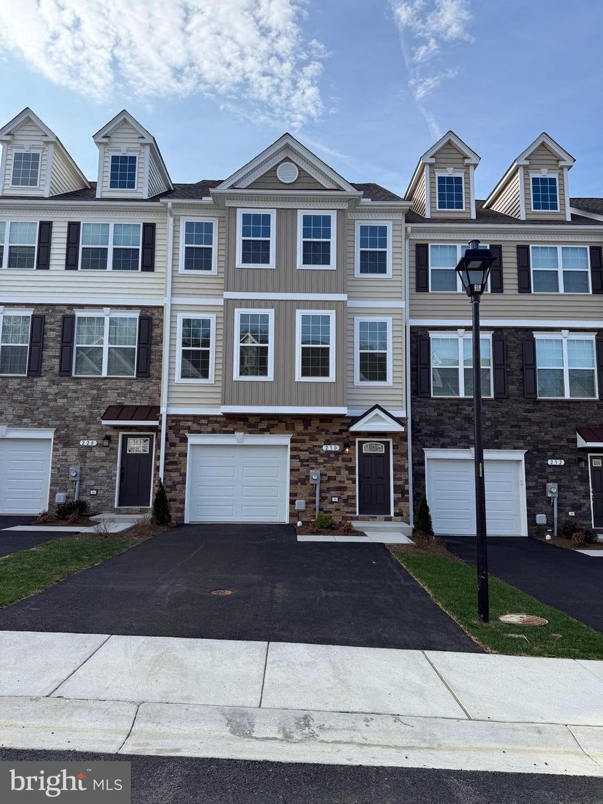 QBHI's beautiful townhome in the heart of Prince Frederick.  Features an oversized Garage, mudroom on main level and enter into either a bedroom or additional recreation room, etc with full bath and closets.  2nd level has a beautiful kitchen, table space area, family room and maintenance free deck overlooking the fenced backyard.  Upper level has the owners suite with tray ceiling, walk in closet, full bath with QBHI's signature deluxe shower.  2 Additional bedrooms, hall bath and laundry room.