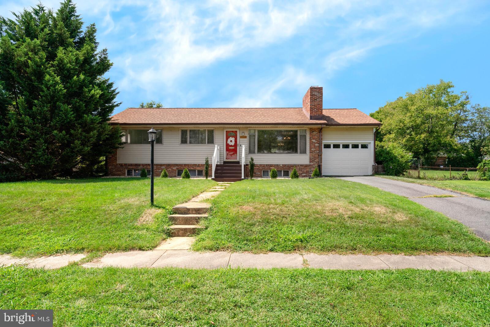 NO PETS AND NOT AVAILABLE UNTIL SEPTEMBER 5TH
Welcome home to this charming rambler with a one-car garage!
Step inside and admire the beautiful hardwood floors that run throughout the bright and inviting living room, highlighted by an oversized picture window and a striking brick wall with a raised hearth wood-burning fireplace.
The remodeled gourmet kitchen is a true standout, featuring elegant tile flooring, soft-close cabinetry with crown molding, quartz countertops, a stylish tile backsplash, and stainless steel appliances—including a five-burner gas range. Additional upgrades include recessed lighting, a breakfast bar, and direct access to the expansive 24' x 13' deck—perfect for outdoor dining and entertaining.
The spacious primary suite includes a remodeled full bath with floor-to-ceiling tile, heated tile flooring, a large glass-enclosed shower, and a fog-free, lighted medicine cabinet. Two more bedrooms and an updated full hall bath with a tub complete the main level.
Head downstairs to a lower level full of character, where you'll find a nostalgic recreation room with classic knotty pine paneling, another raised-hearth wood-burning fireplace, and a retro-style bar with original stools. This level also includes a den, utility room, and ample storage space.
Additional highlights include a high-power electric vehicle charger in the garage, a fully fenced backyard, and a spacious deck ideal for summer BBQs and gatherings.
Located in a peaceful neighborhood just a short walk to Glasgow Park, Holmes Run Trail, and a convenient bus stop with direct routes to the Pentagon, East Falls Church Metro, and Northern Virginia Community College. Just a quick drive away are Harris Teeter, Trader Joe’s, Giant, Aldi, shopping centers, local restaurants, the library, and the Parklawn Pool.